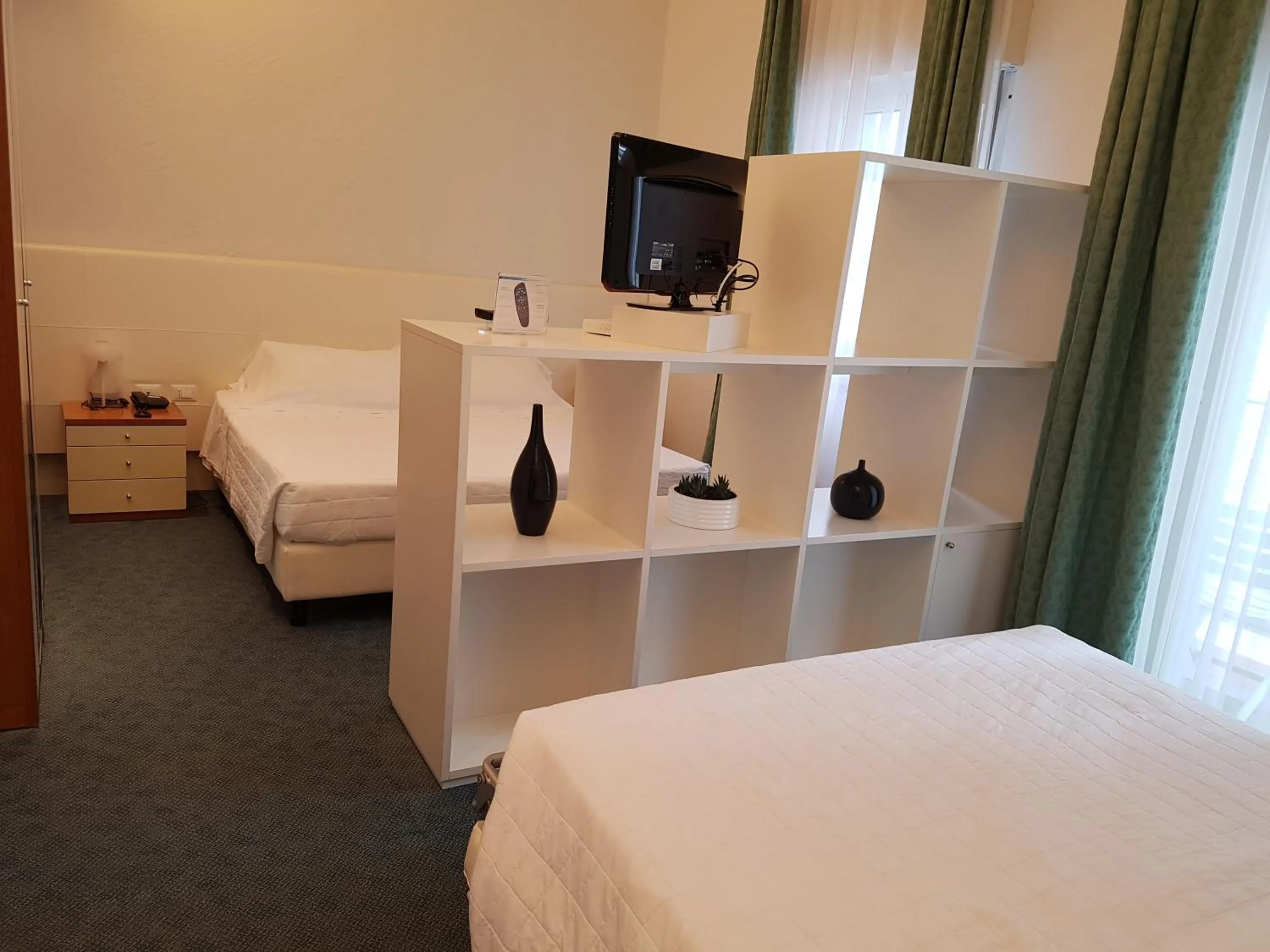 Photo of the whole room, Bed in Hotel Sorriso