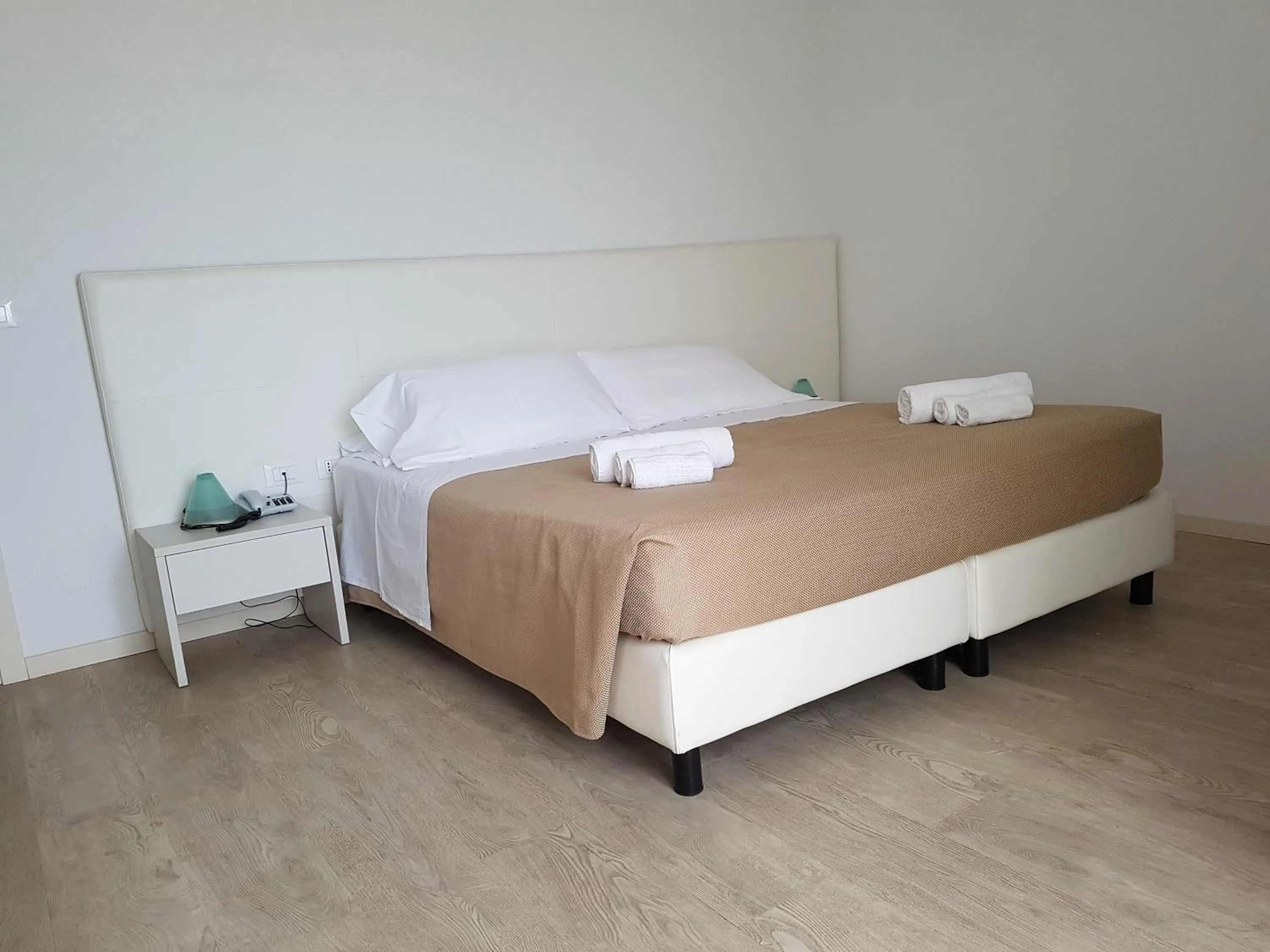 Bed in Hotel Sorriso