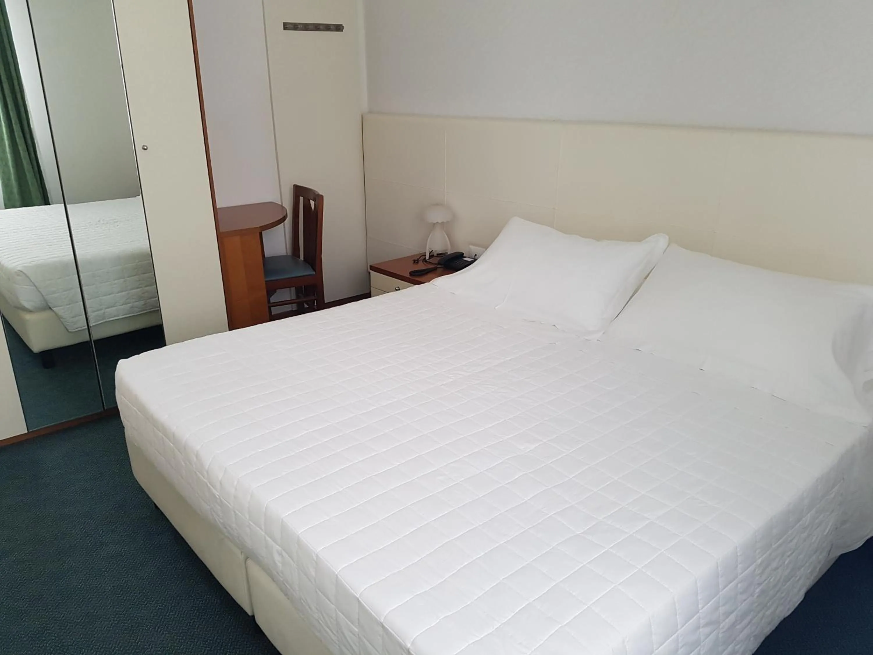 Bed in Hotel Sorriso