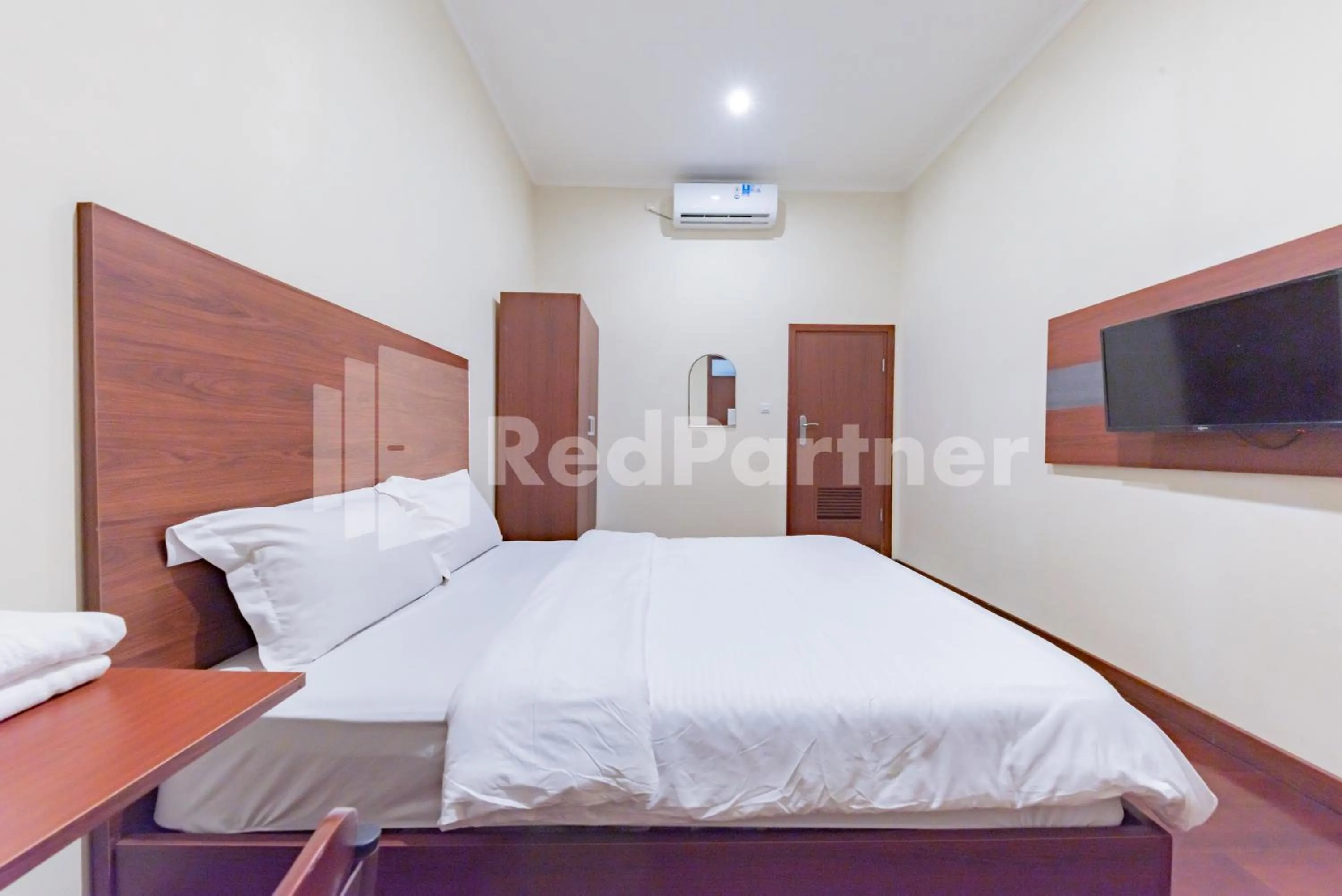 Bed in Maleo Residence Bandung Mitra RedDoorz
