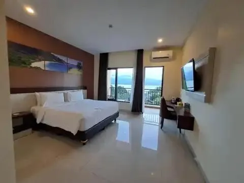 Bed in Hotel Simfony Alor