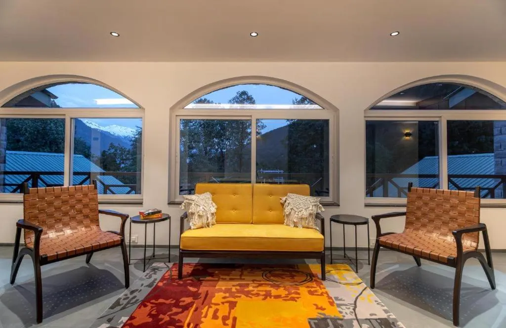 Seating area in Nivasana Manali - A Luxury Boutique Hotel
