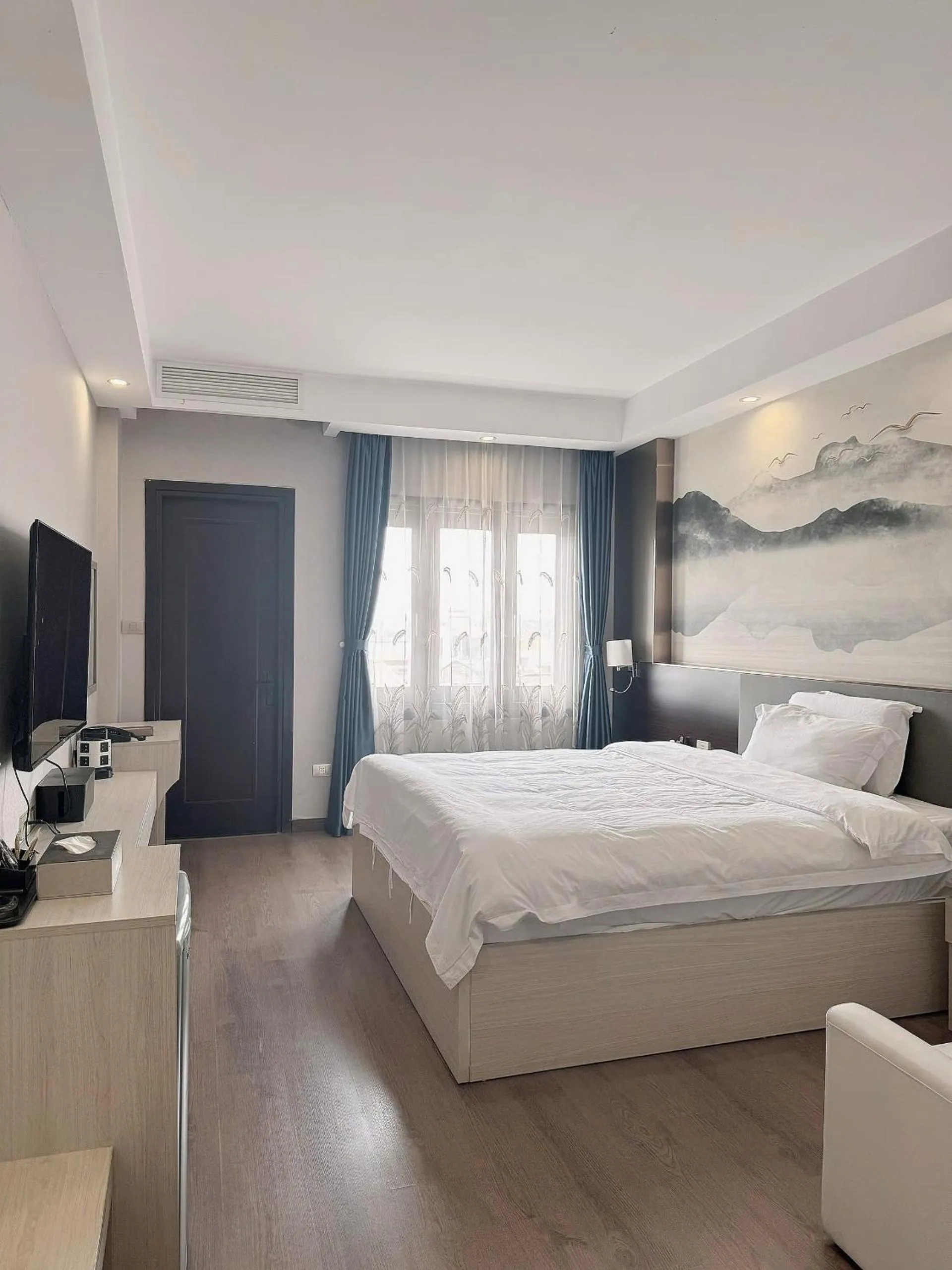 Bed in 东都明月酒店Dong Do Minh Nguyet