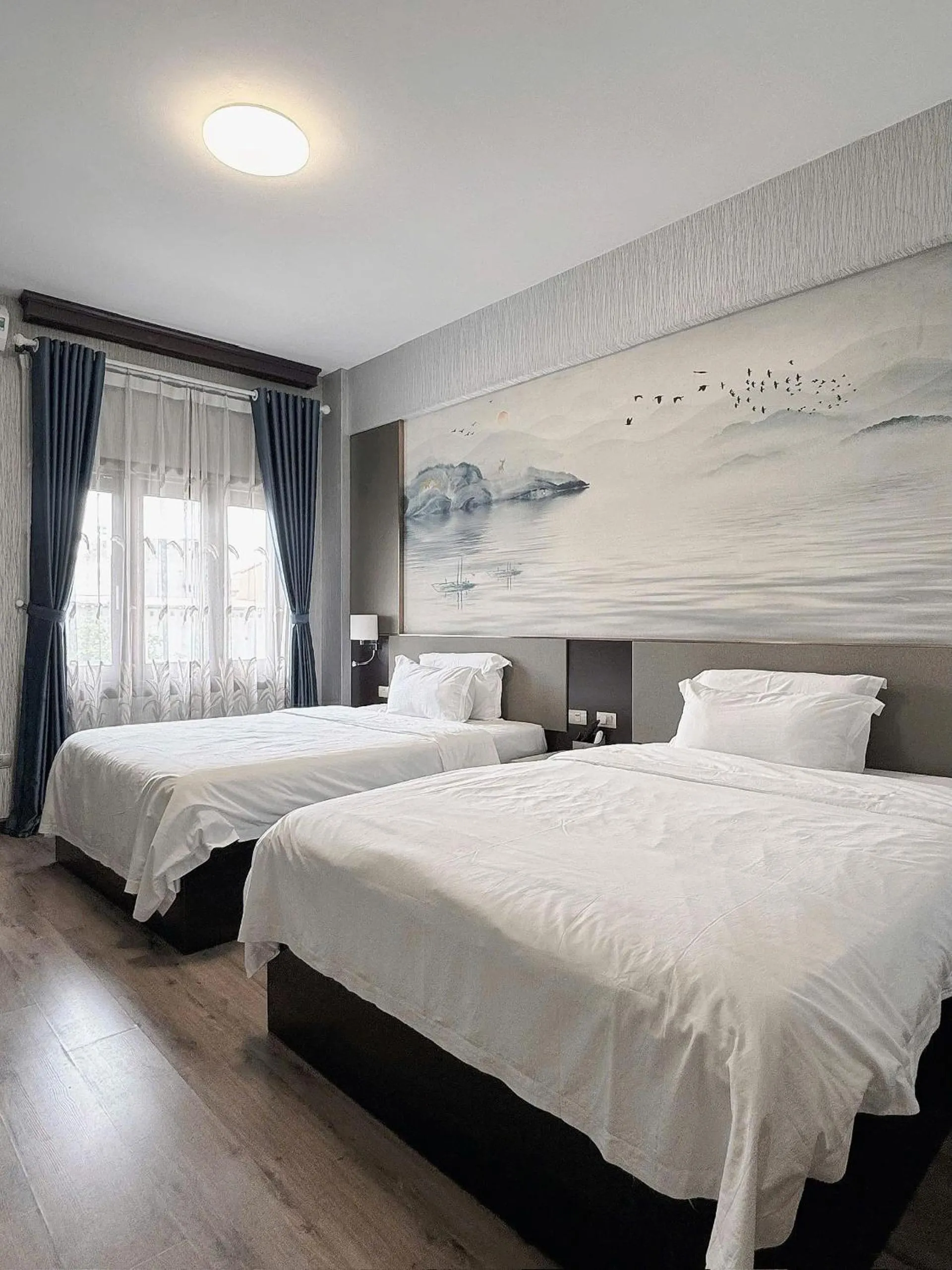 Bed in 东都明月酒店Dong Do Minh Nguyet