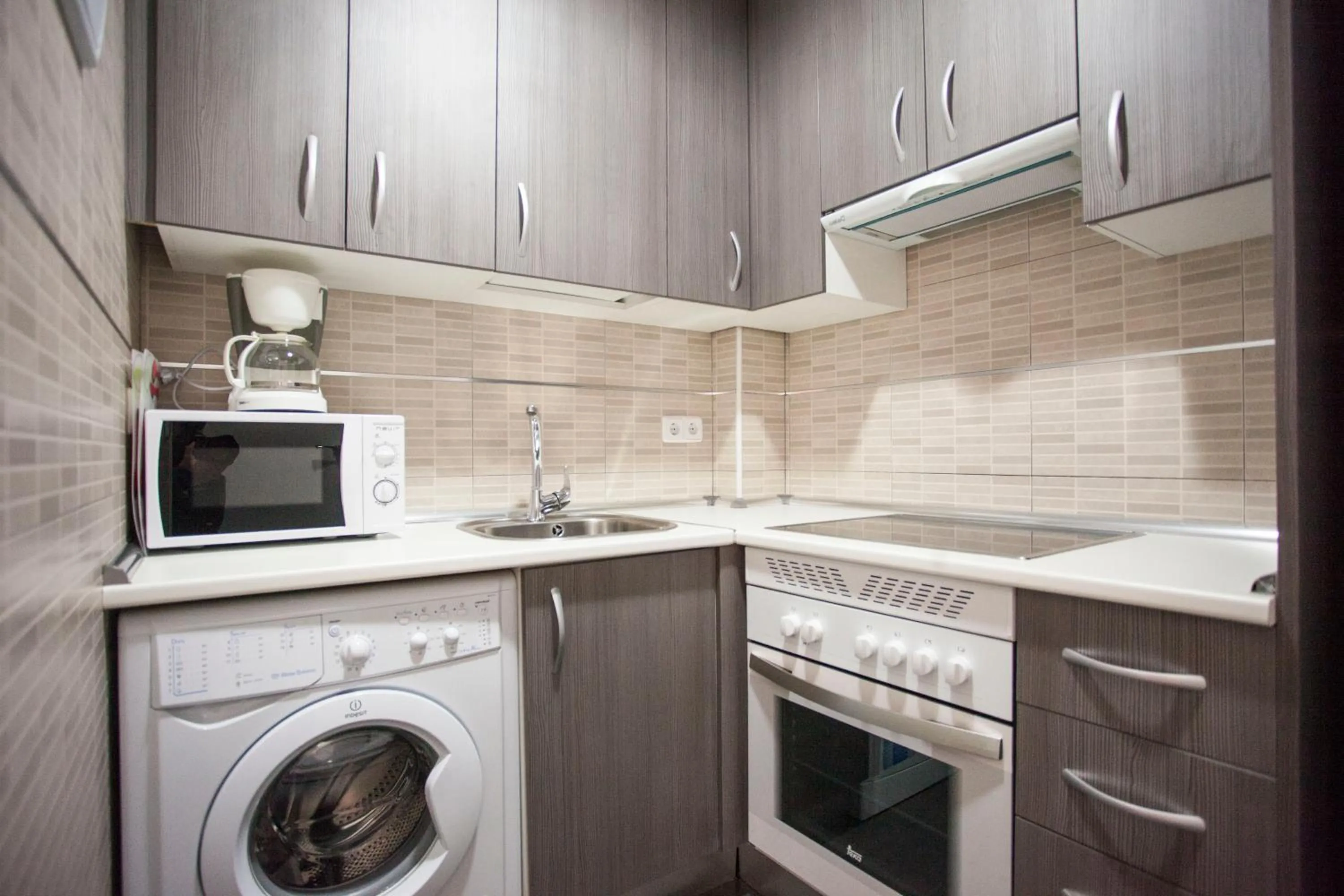 Kitchen or kitchenette in Fuencarral Apartments