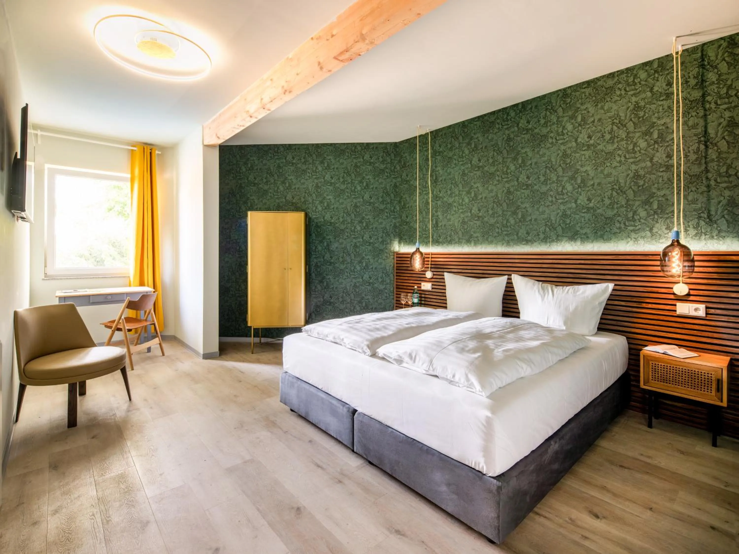 Bed in Stuckhotel Fettehenne