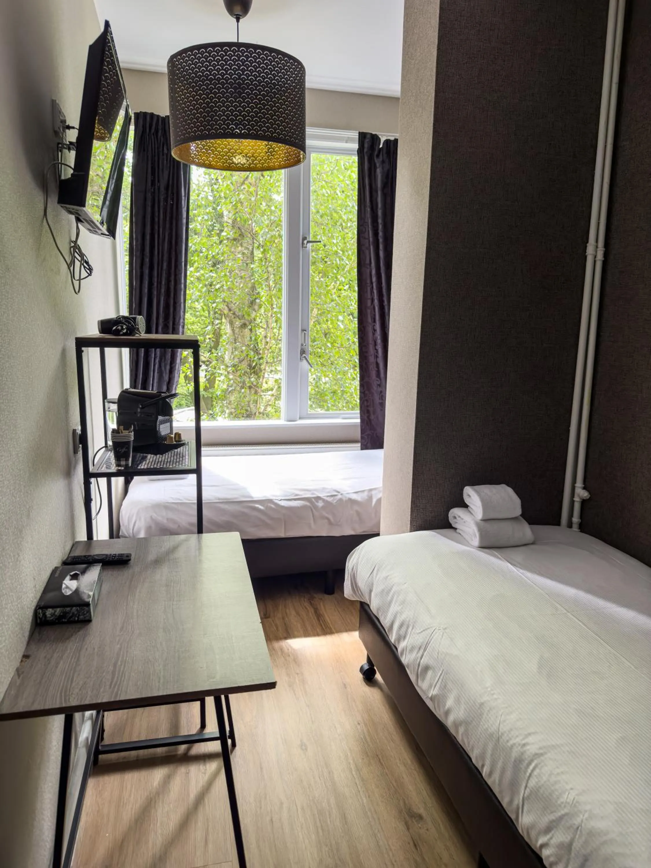 Bed in Hotel Vondel Garden