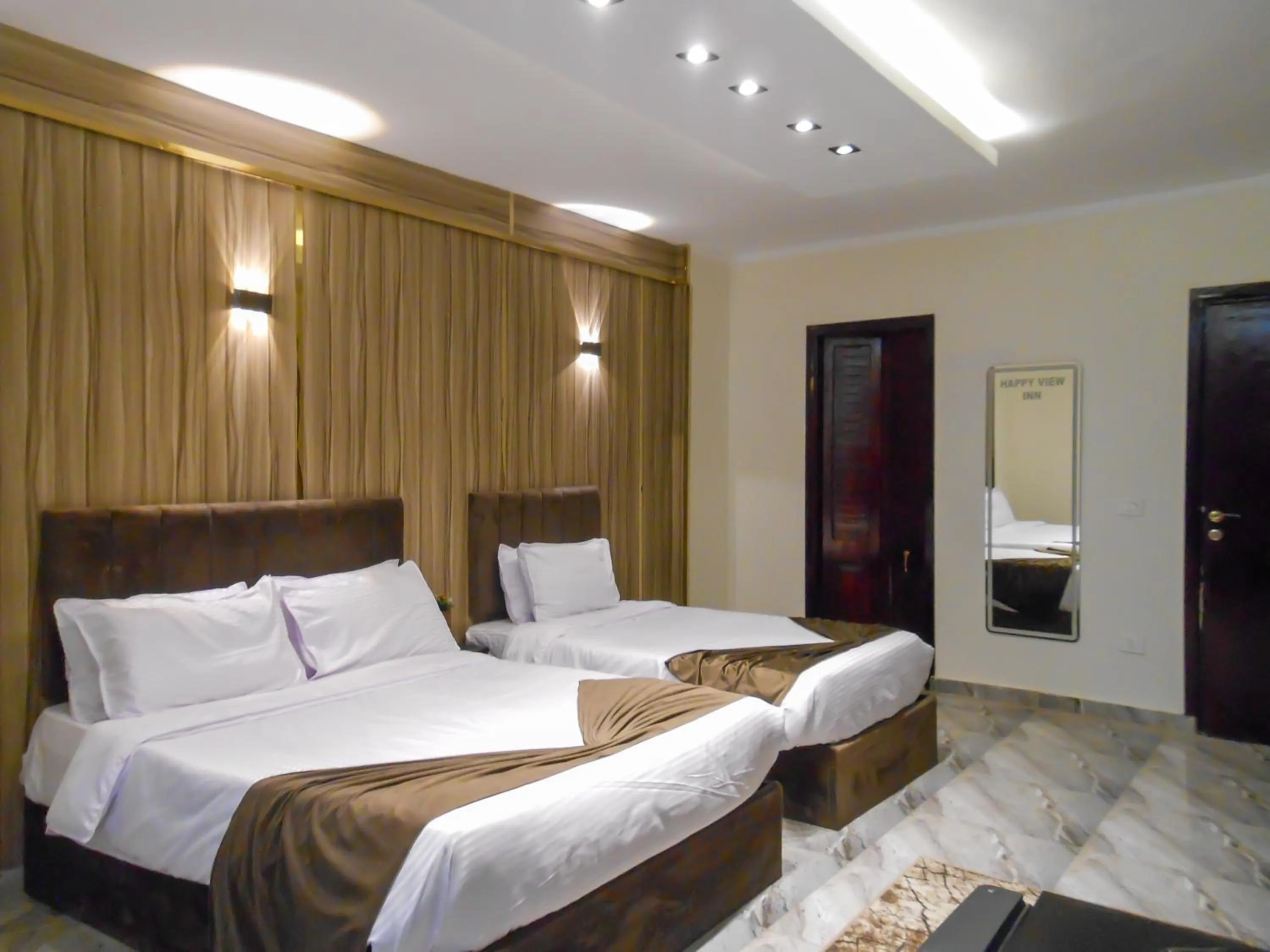 Bed in Happy View Inn