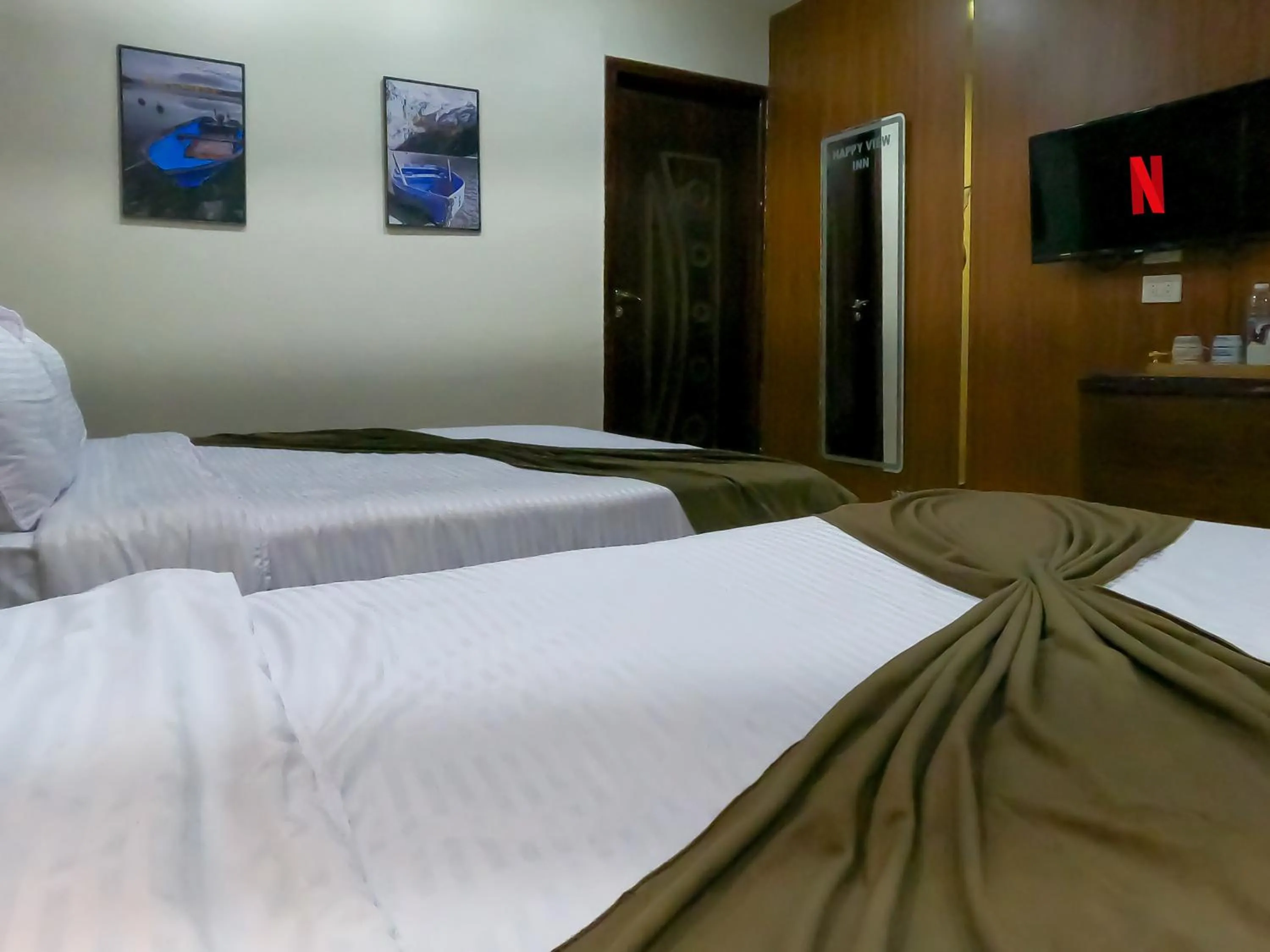 Bed in Happy View Inn