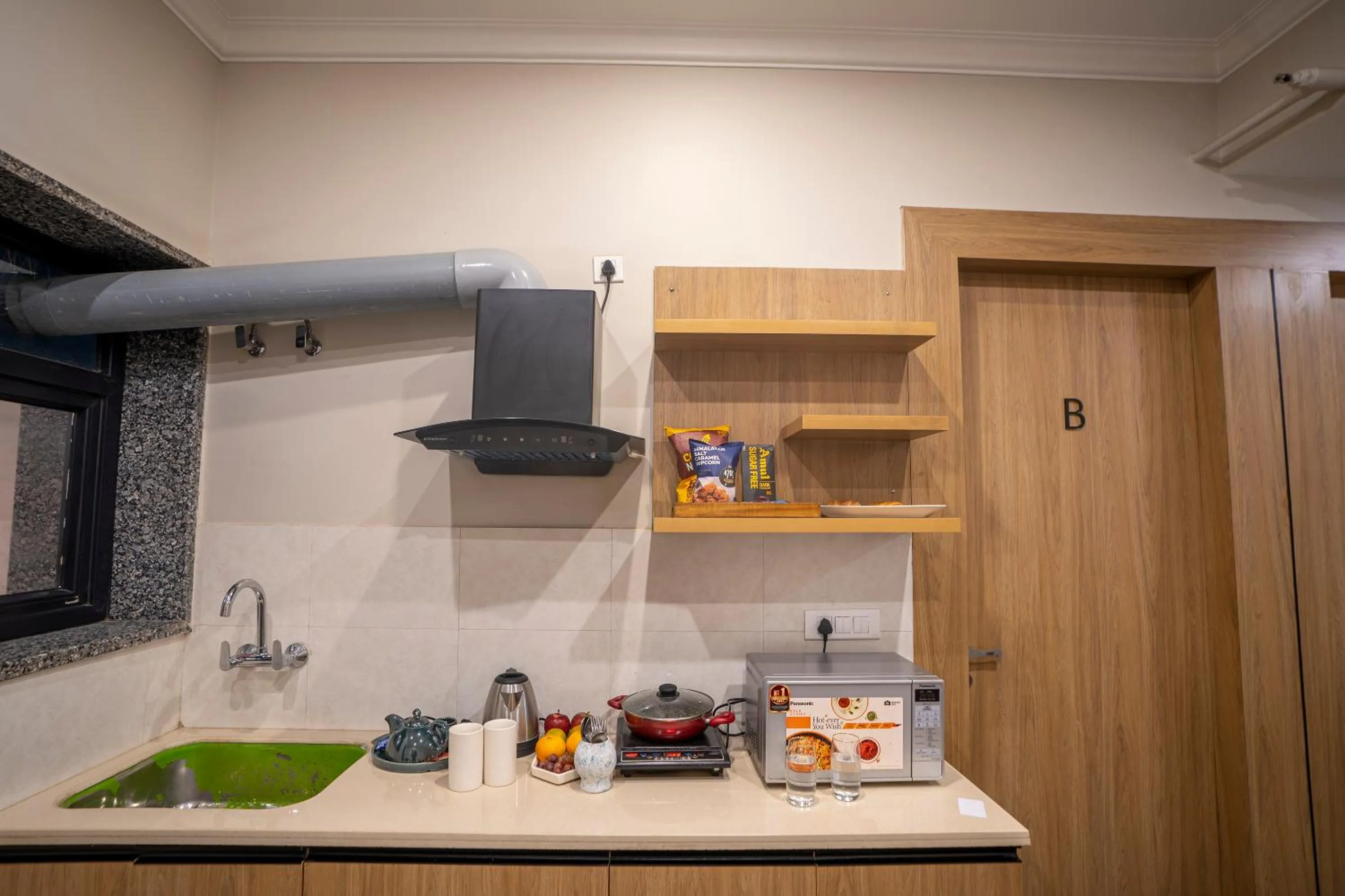 Kitchen or kitchenette in Vacanza By Westay Luxury Home