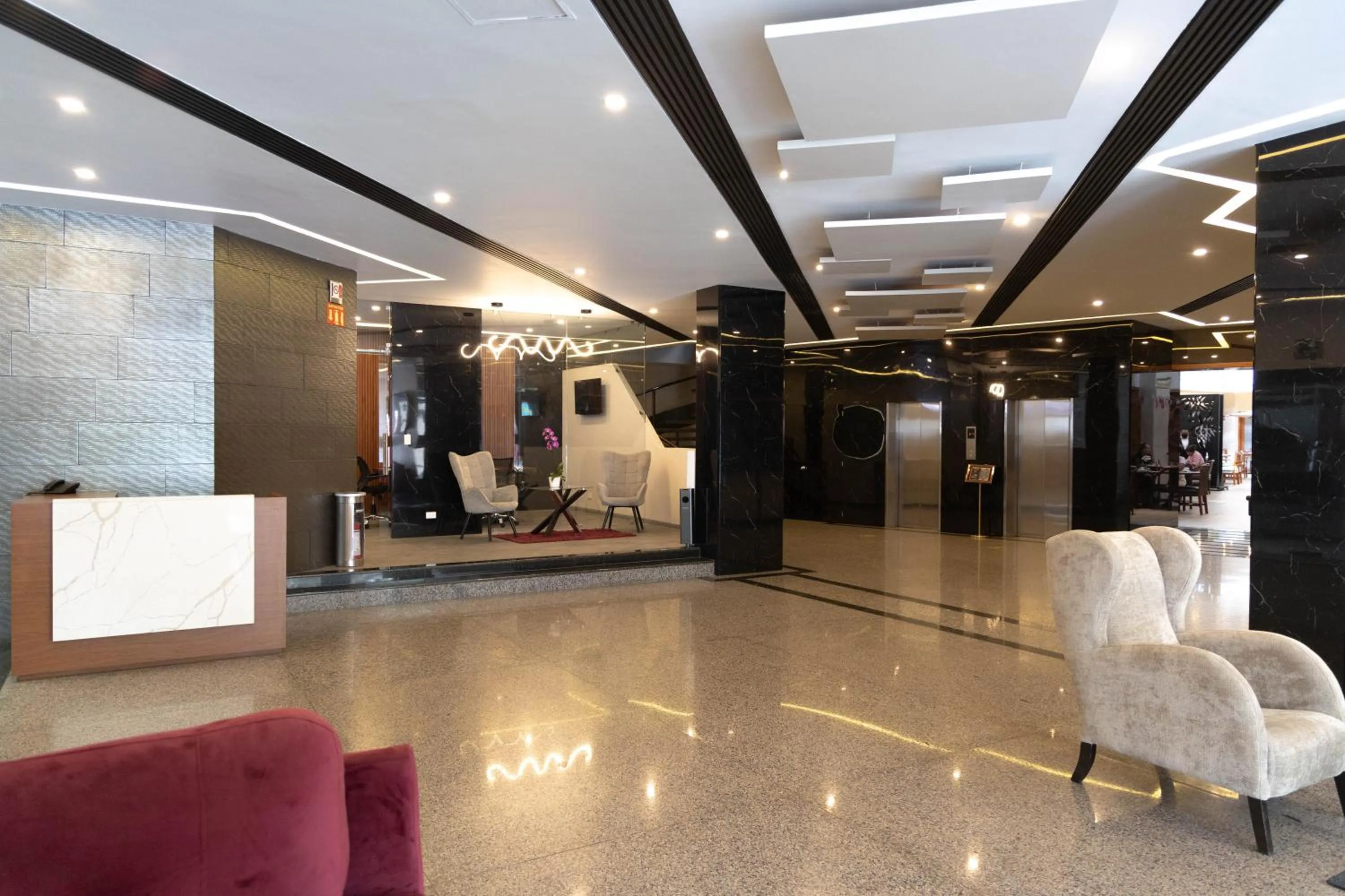 Lobby or reception in Hotel Abastos Plaza
