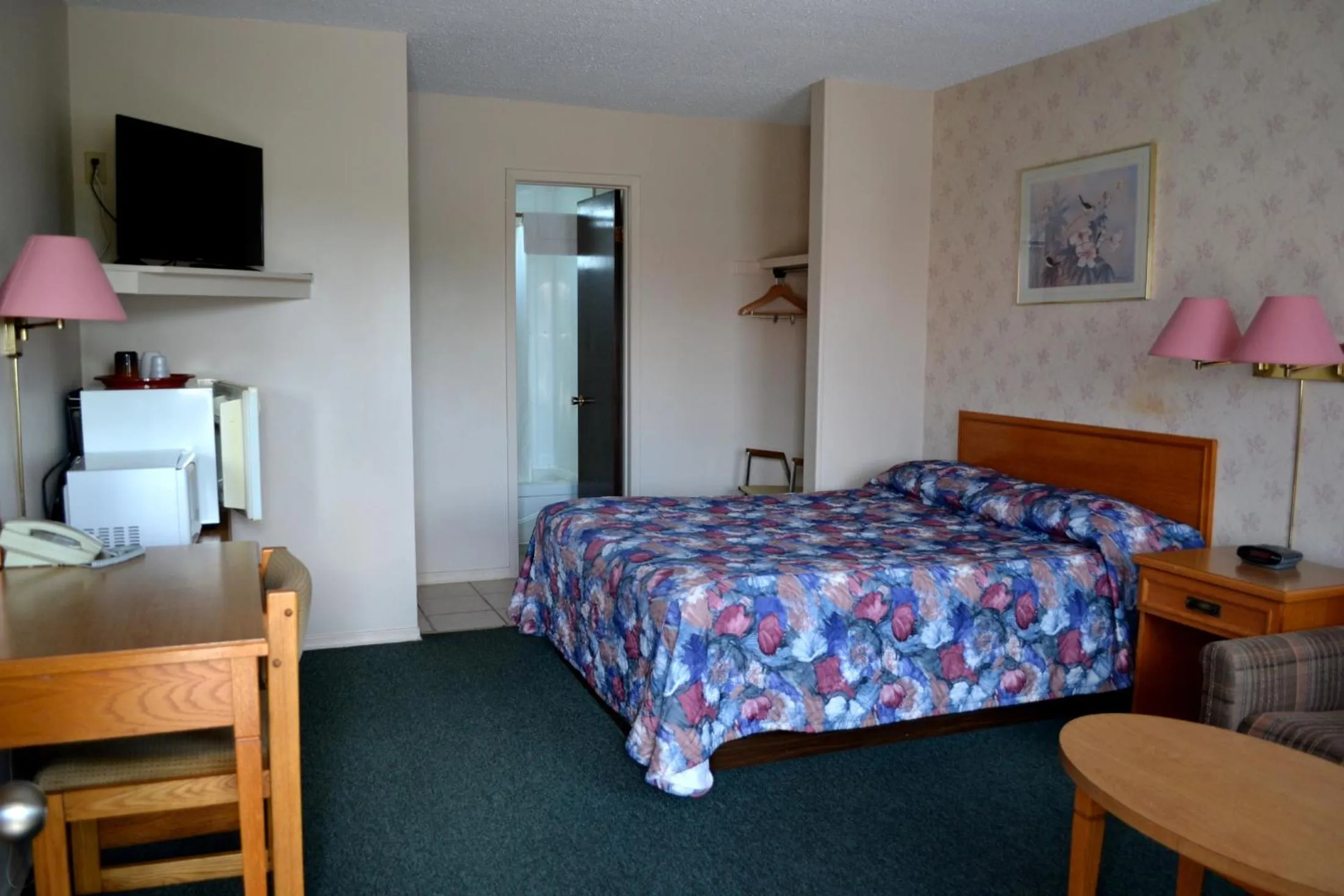 Bed in Lighthouse Motel