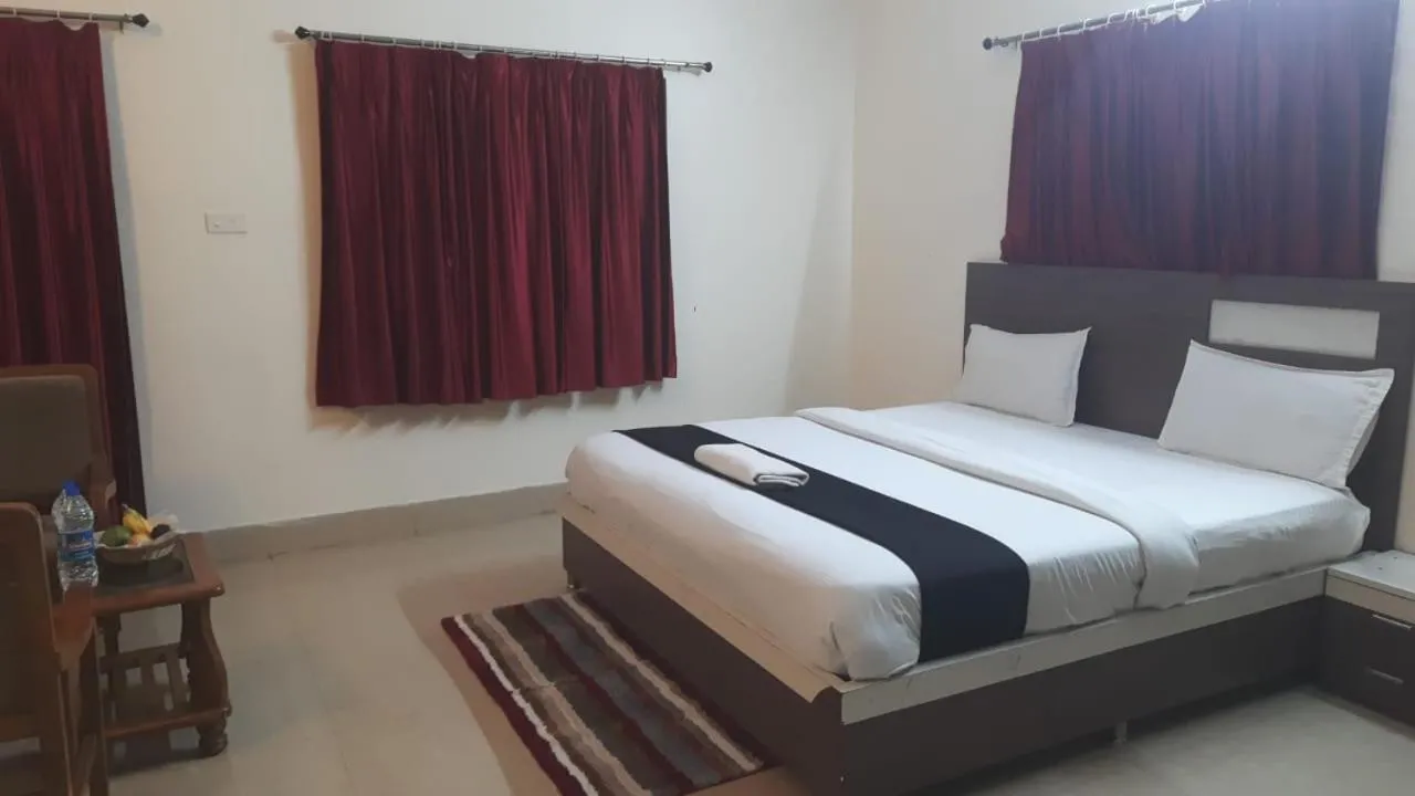 Bed in ROYAL CHETAN INN