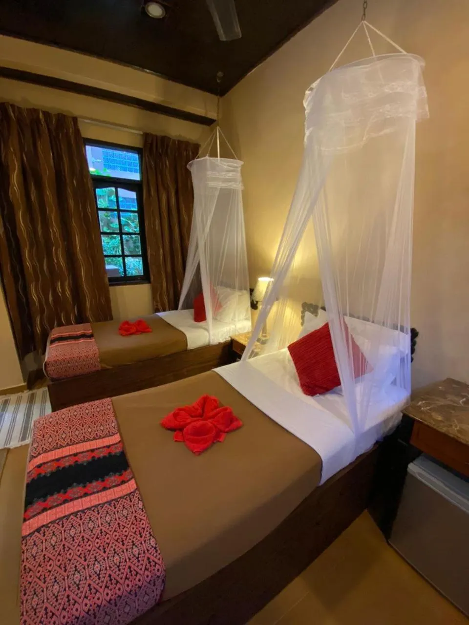 Bed in Ombak Dive Resort Perhentian Island