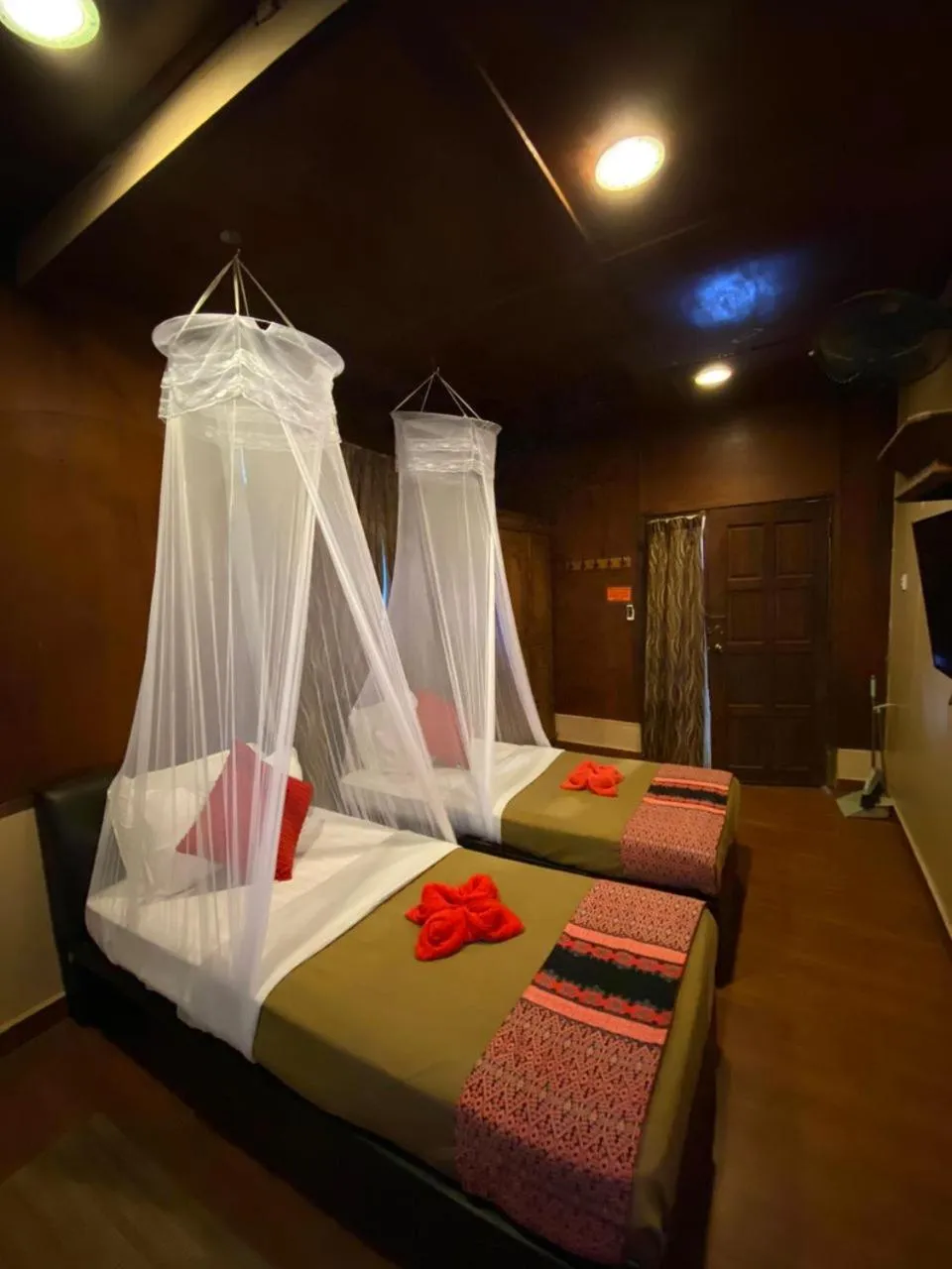 Bed in Ombak Dive Resort Perhentian Island