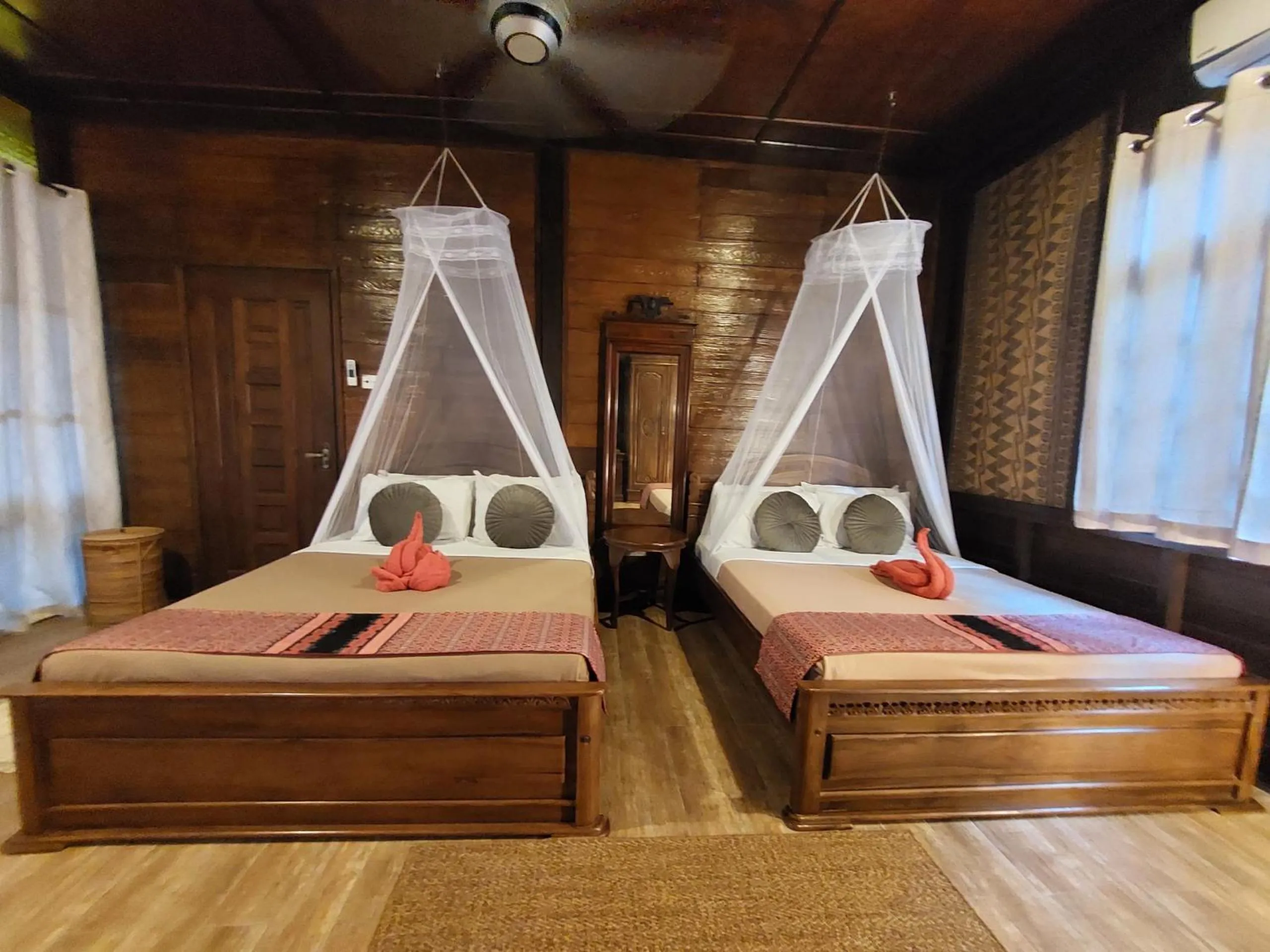 Bed in Ombak Dive Resort Perhentian Island