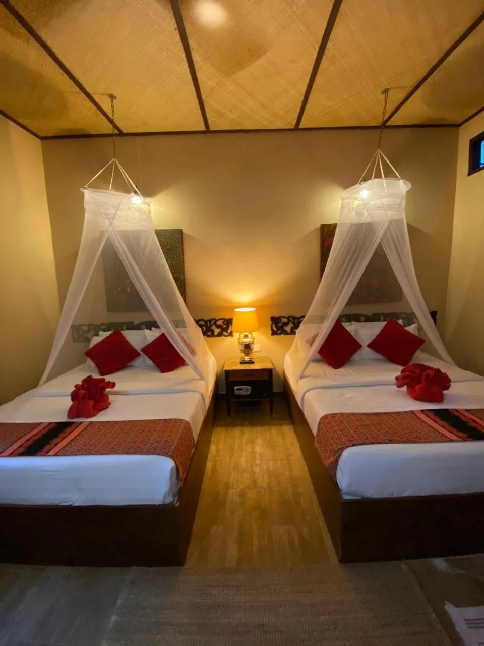 Bed in Ombak Dive Resort Perhentian Island