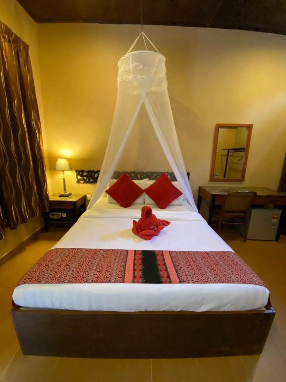 Bed in Ombak Dive Resort Perhentian Island