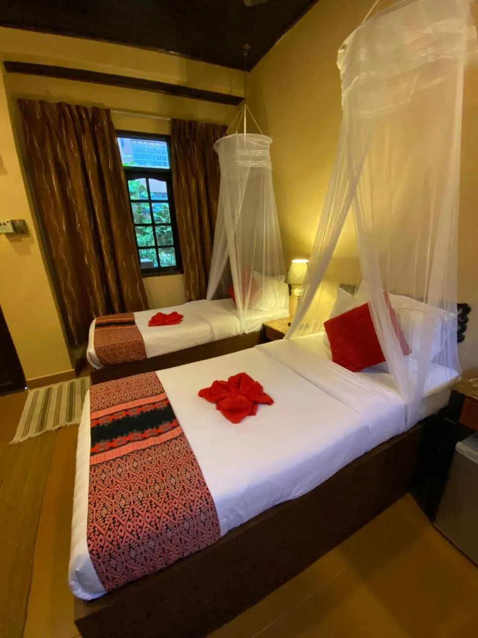 Bed in Ombak Dive Resort Perhentian Island