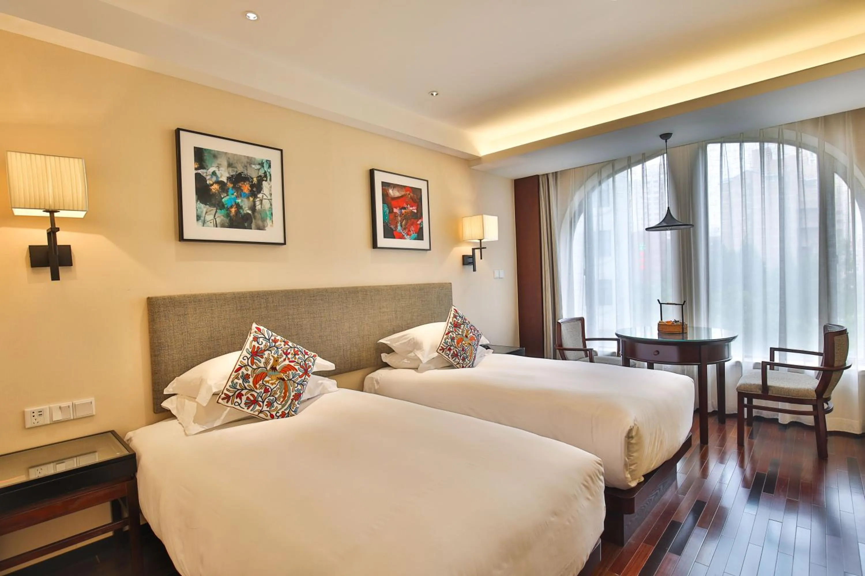 Bed in SSAW Boutique Hotel Shanghai Hongkou