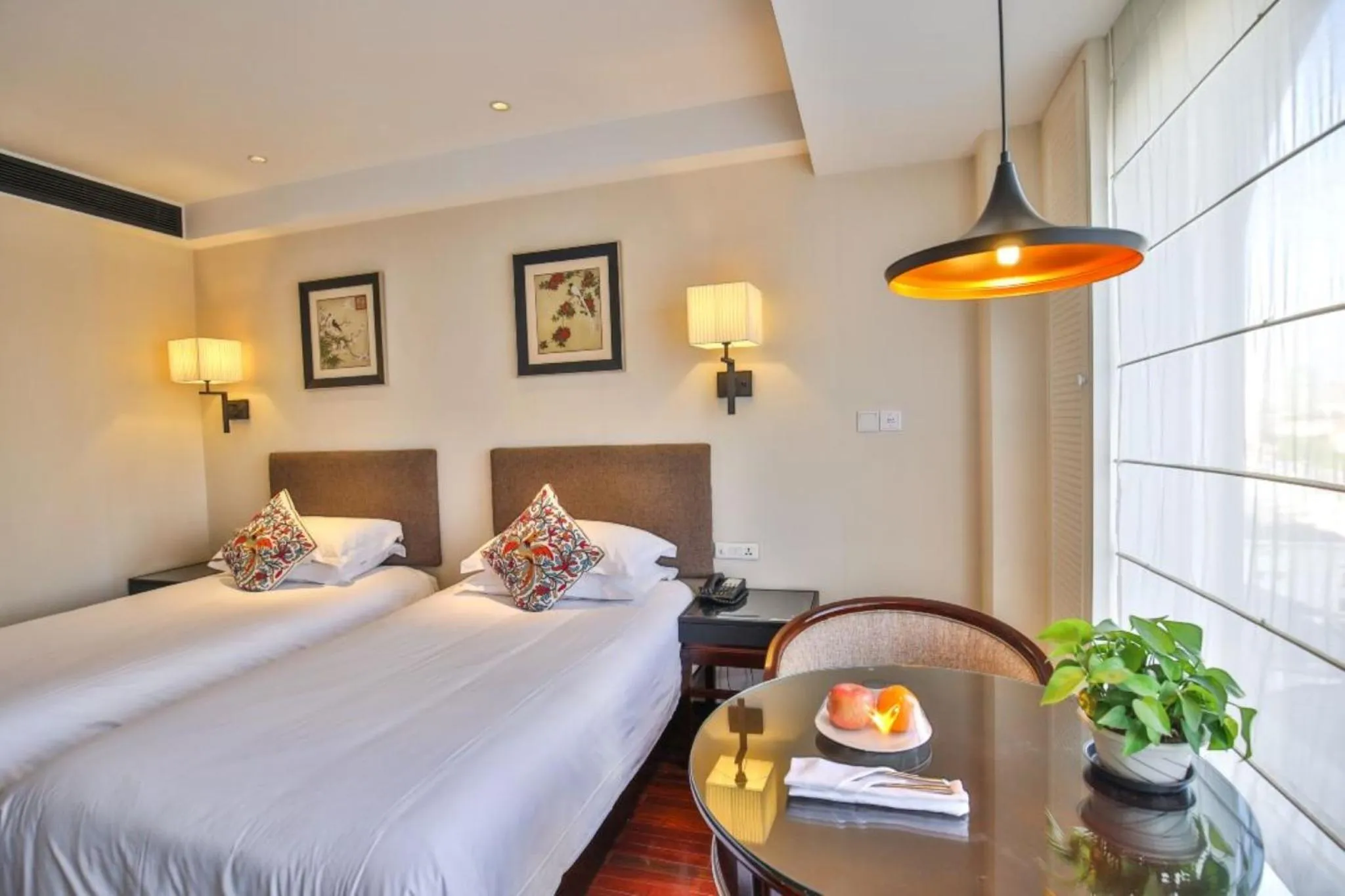 Bed in SSAW Boutique Hotel Shanghai Hongkou