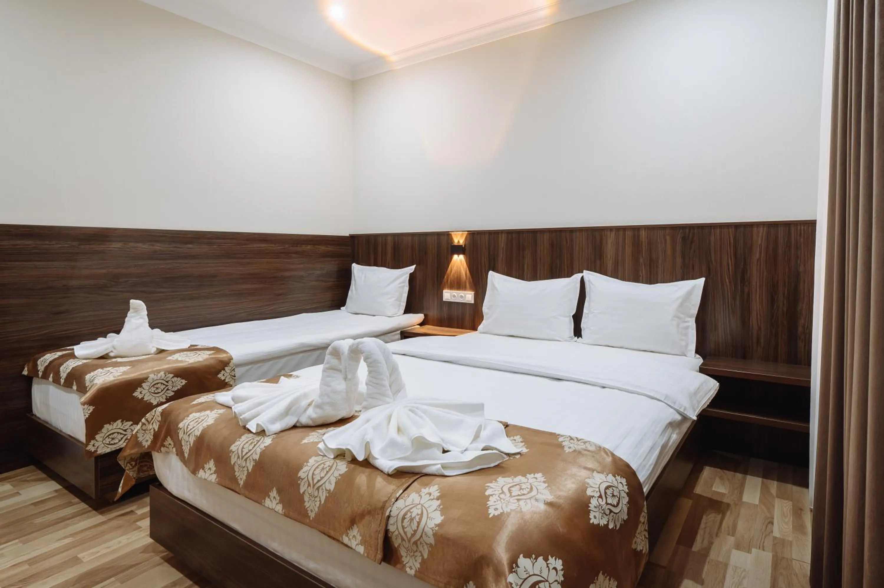 Bed in Sofiya Tashkent Hotel