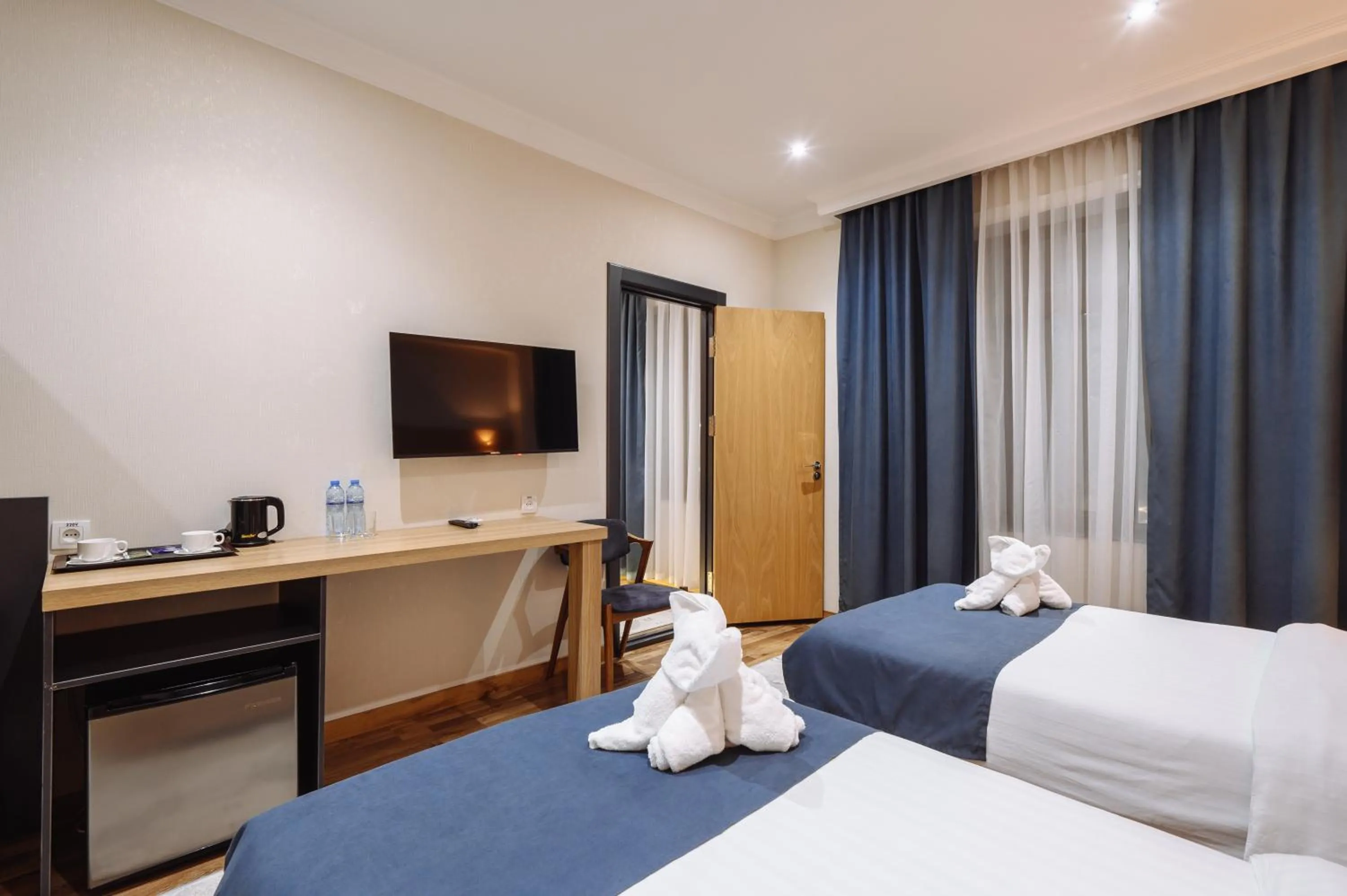 TV and multimedia, Bed in Sofiya Tashkent Hotel