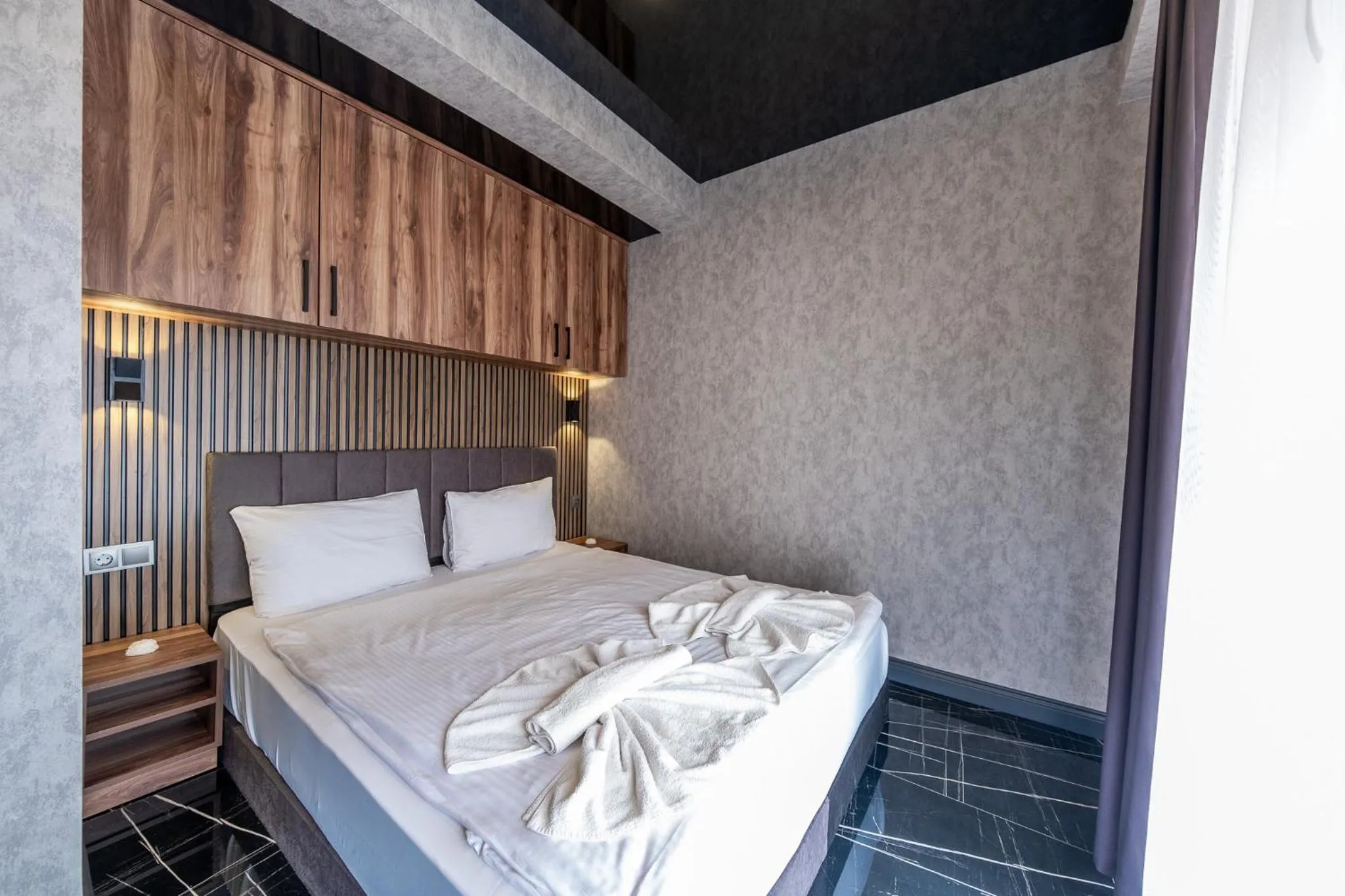 Bed in Mrt Suites Lara