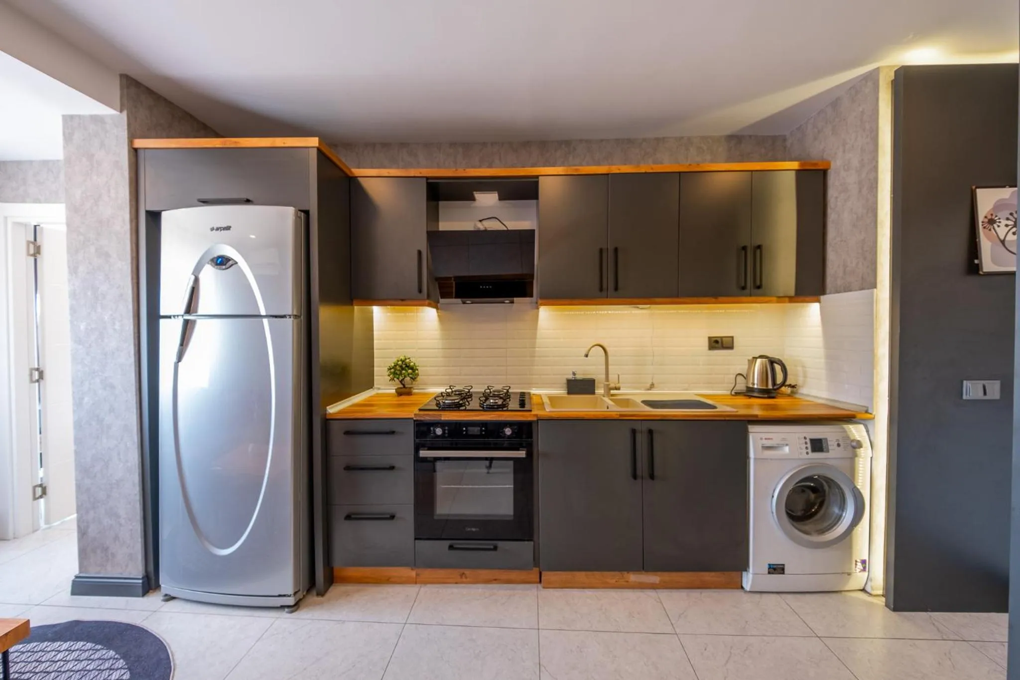 Kitchen or kitchenette in Mrt Suites Lara