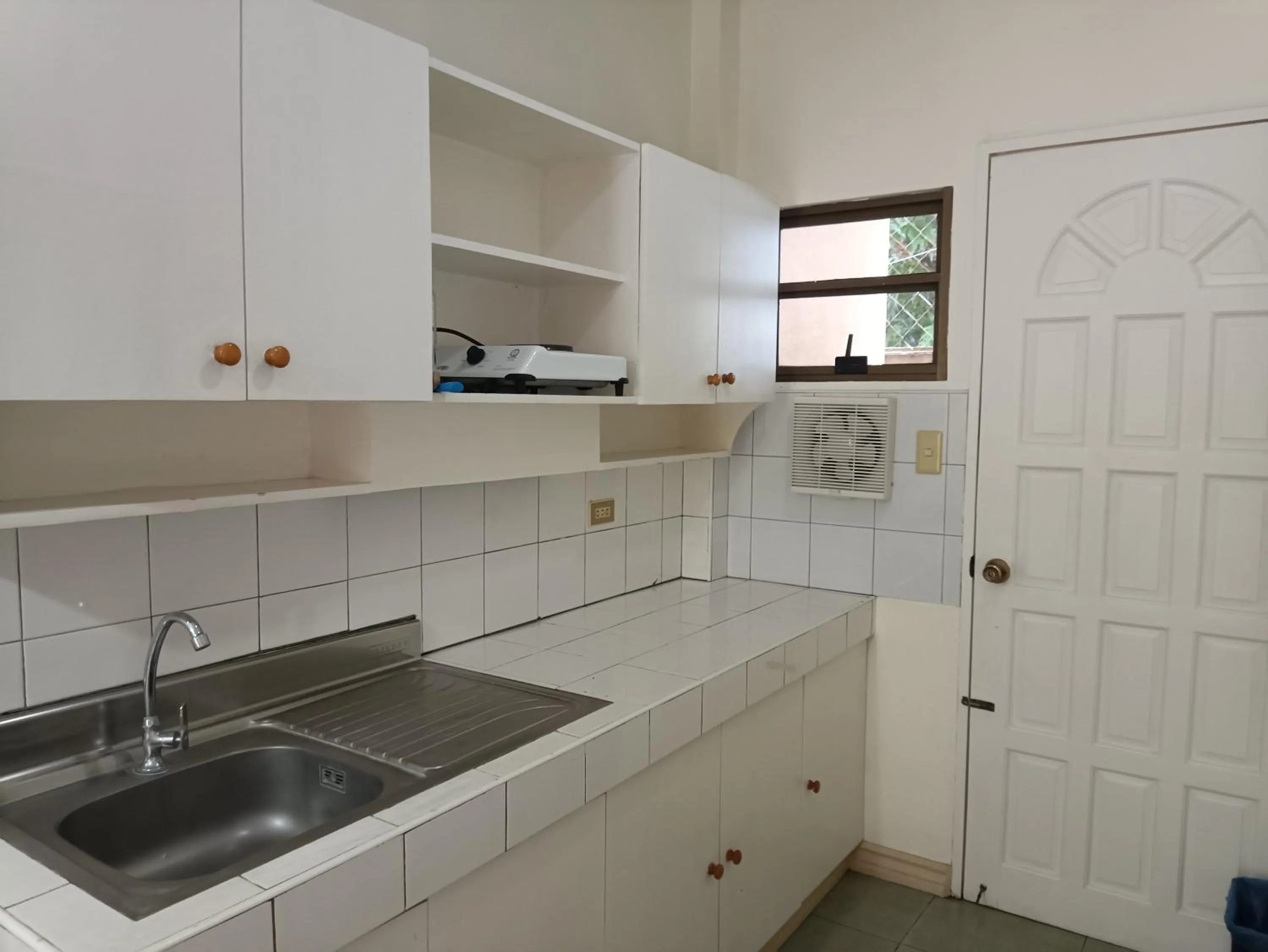 Kitchen or kitchenette in Golden Belle Apartelle and Suites