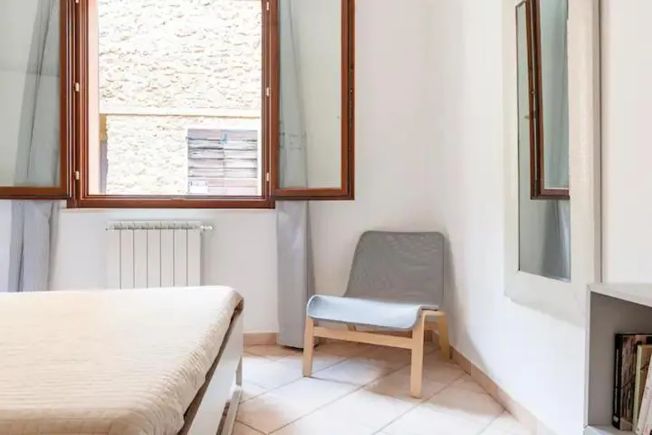 Bedroom, Bed in Casa Nadia - Incantevole appartamento con giardino