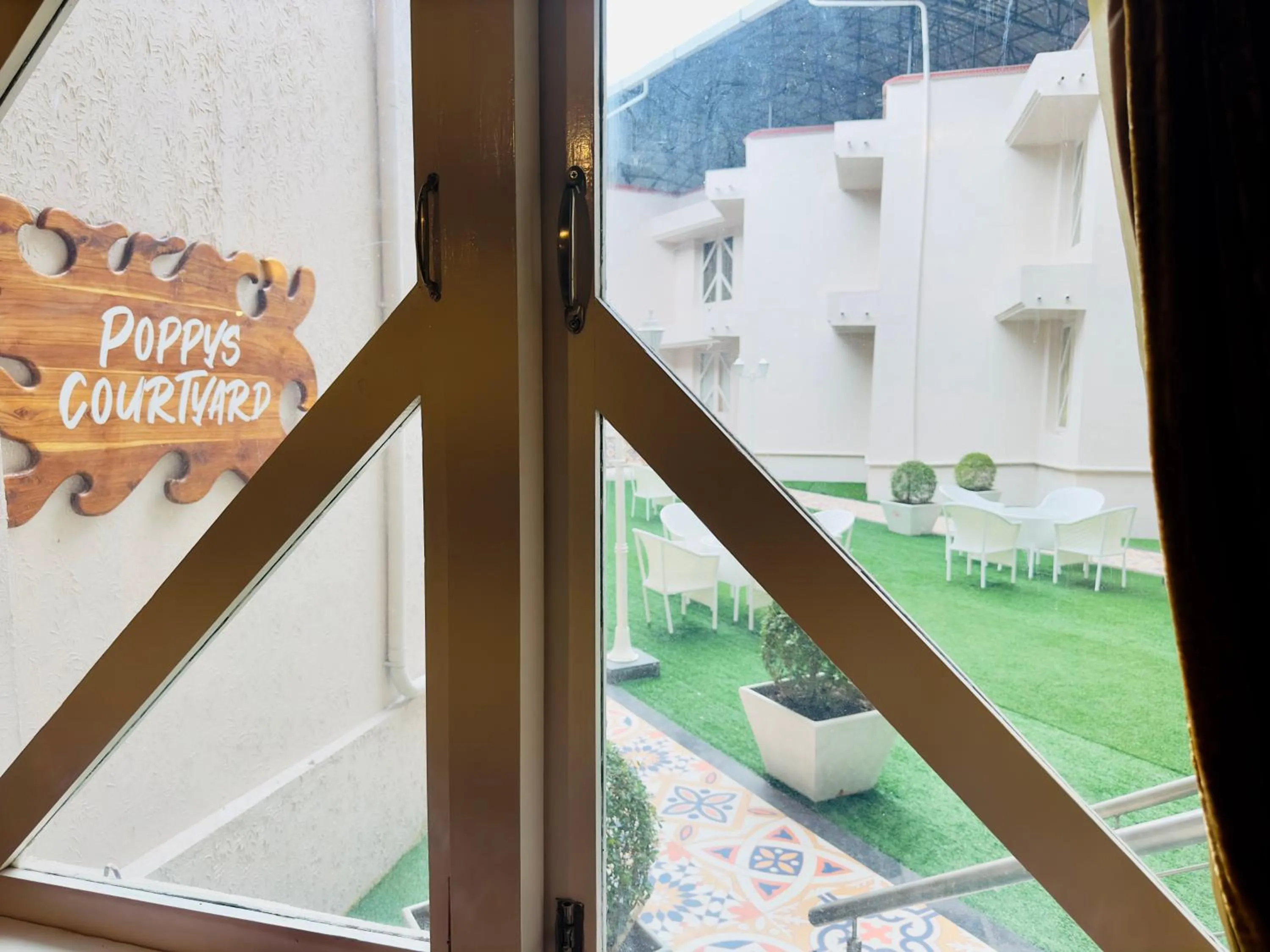 Garden view in Poppys Pleasant Stay