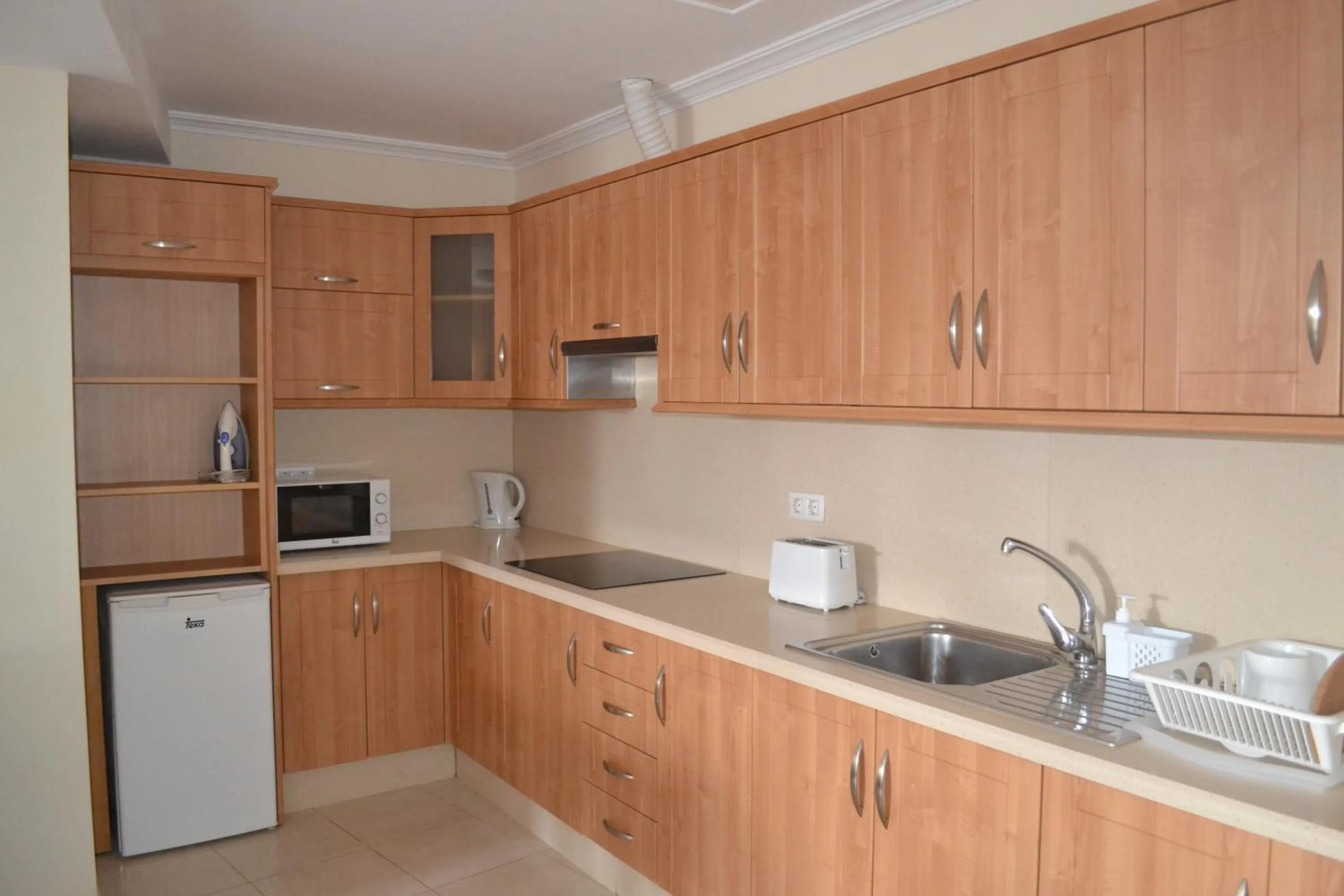 Kitchen or kitchenette in Apartamentos Garden Atlantis en Club Atlantis