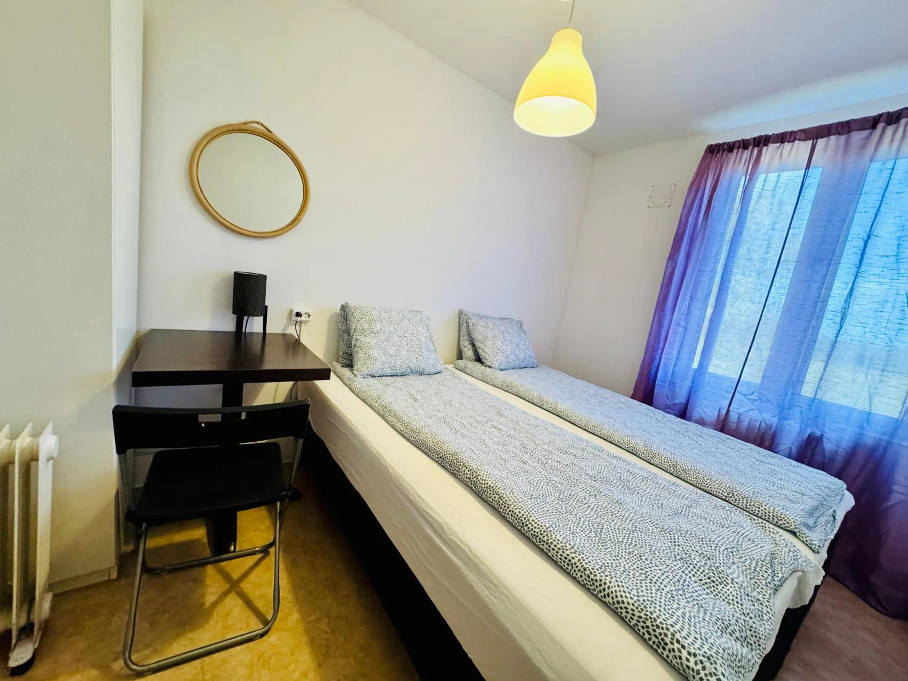 Bed in Hässlebogården Turist & Konferens