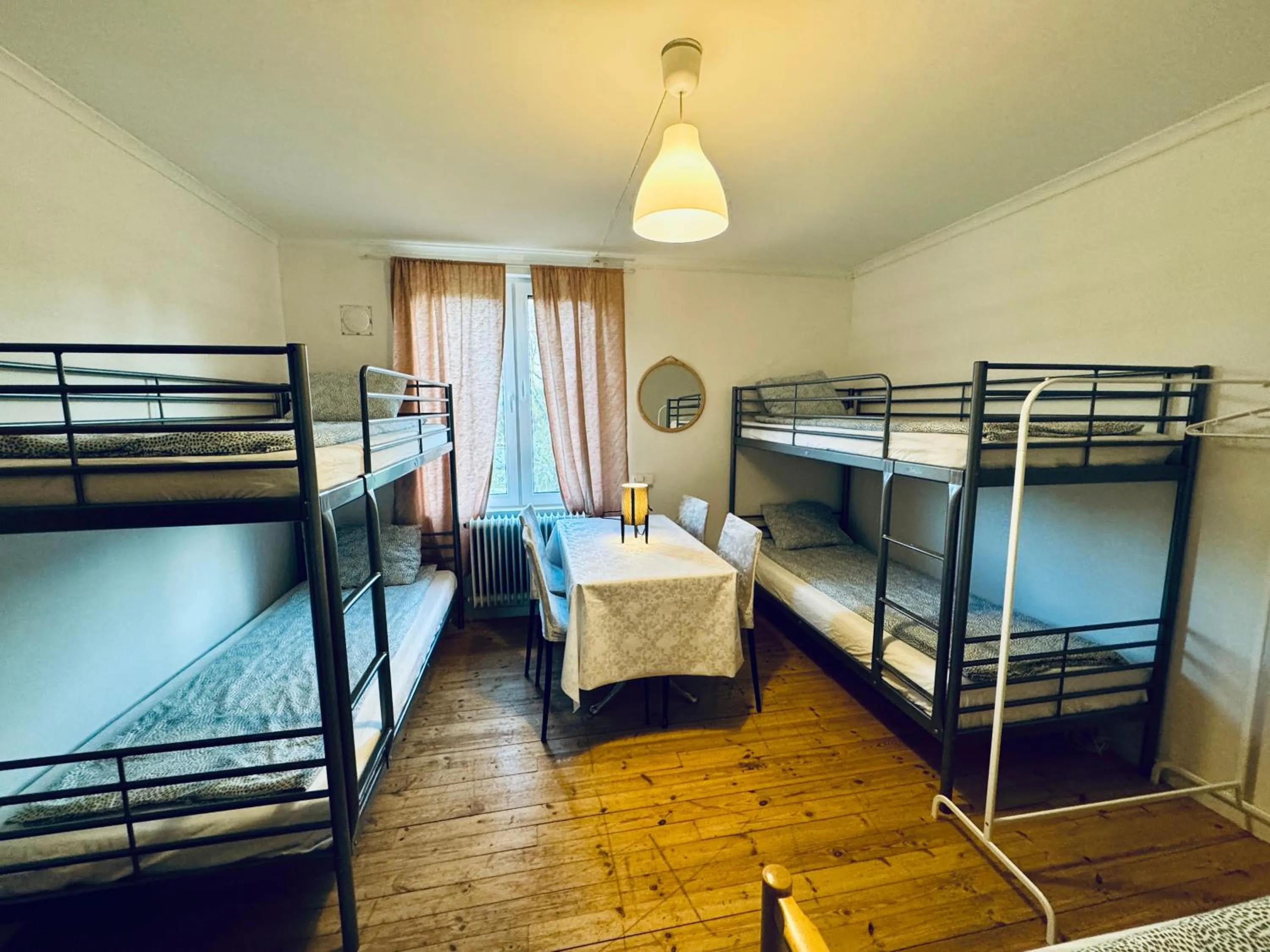 Bed in Hässlebogården Turist & Konferens