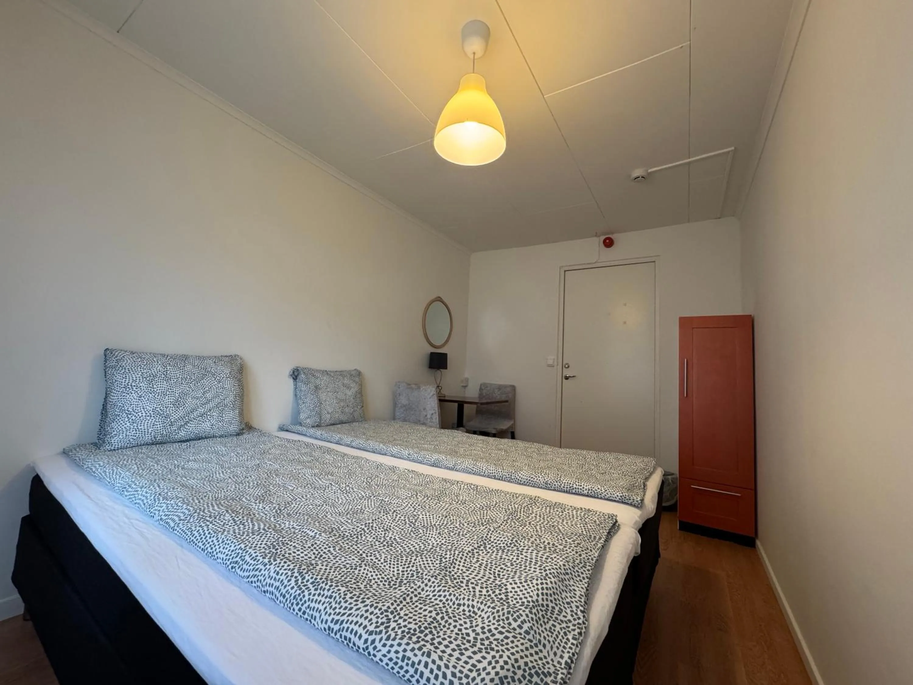 Bed in Hässlebogården Turist & Konferens