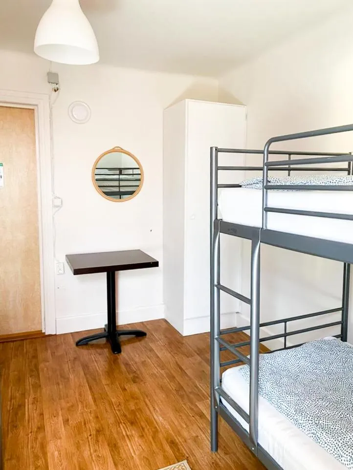 Bed in Hässlebogården Turist & Konferens