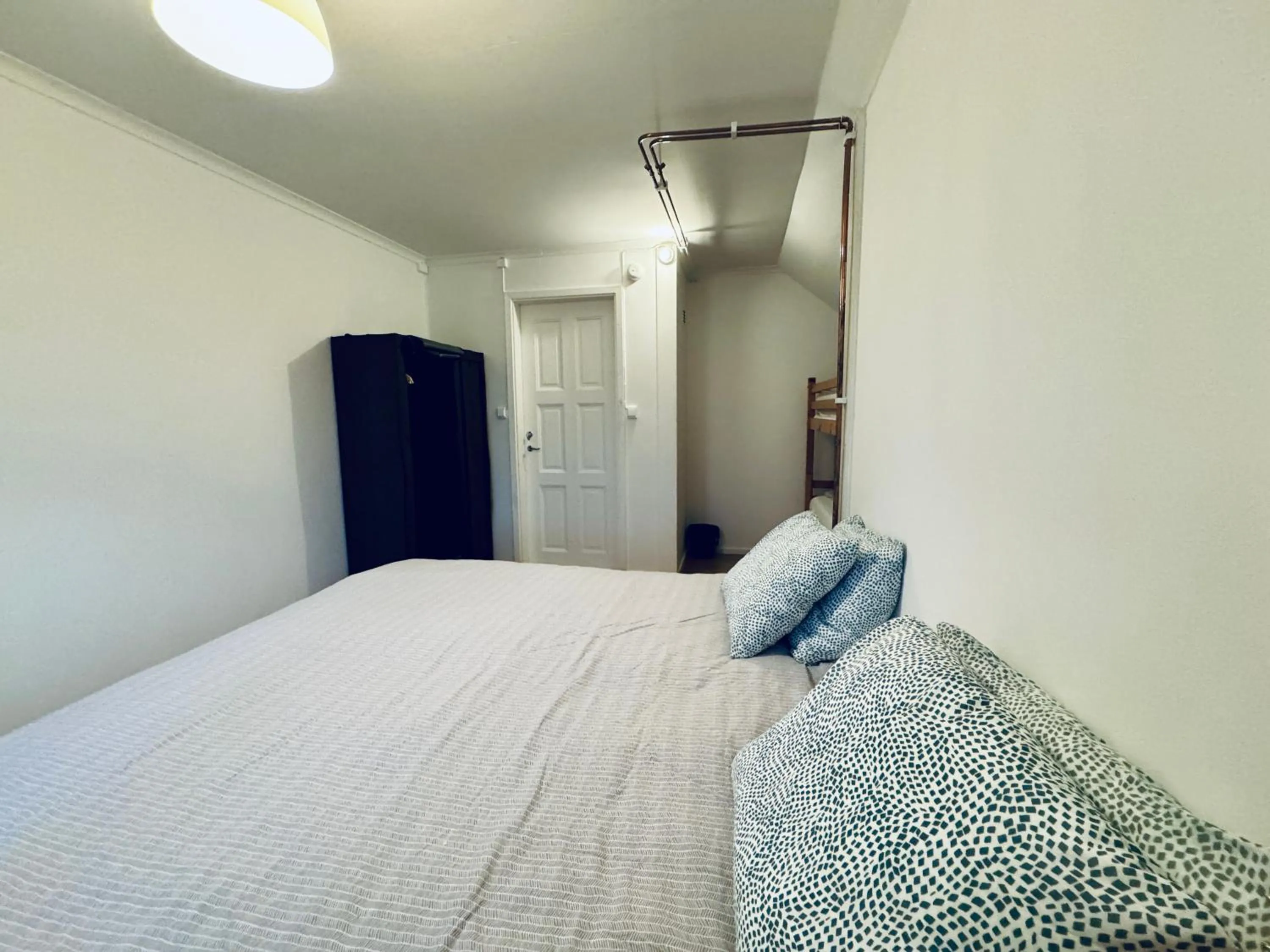 Bed in Hässlebogården Turist & Konferens