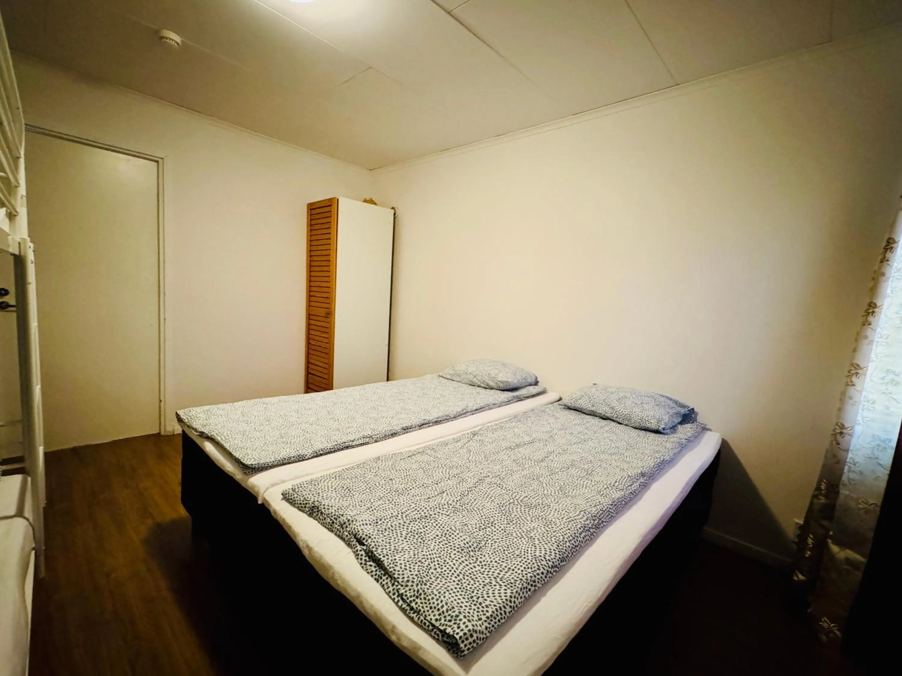 Bed in Hässlebogården Turist & Konferens