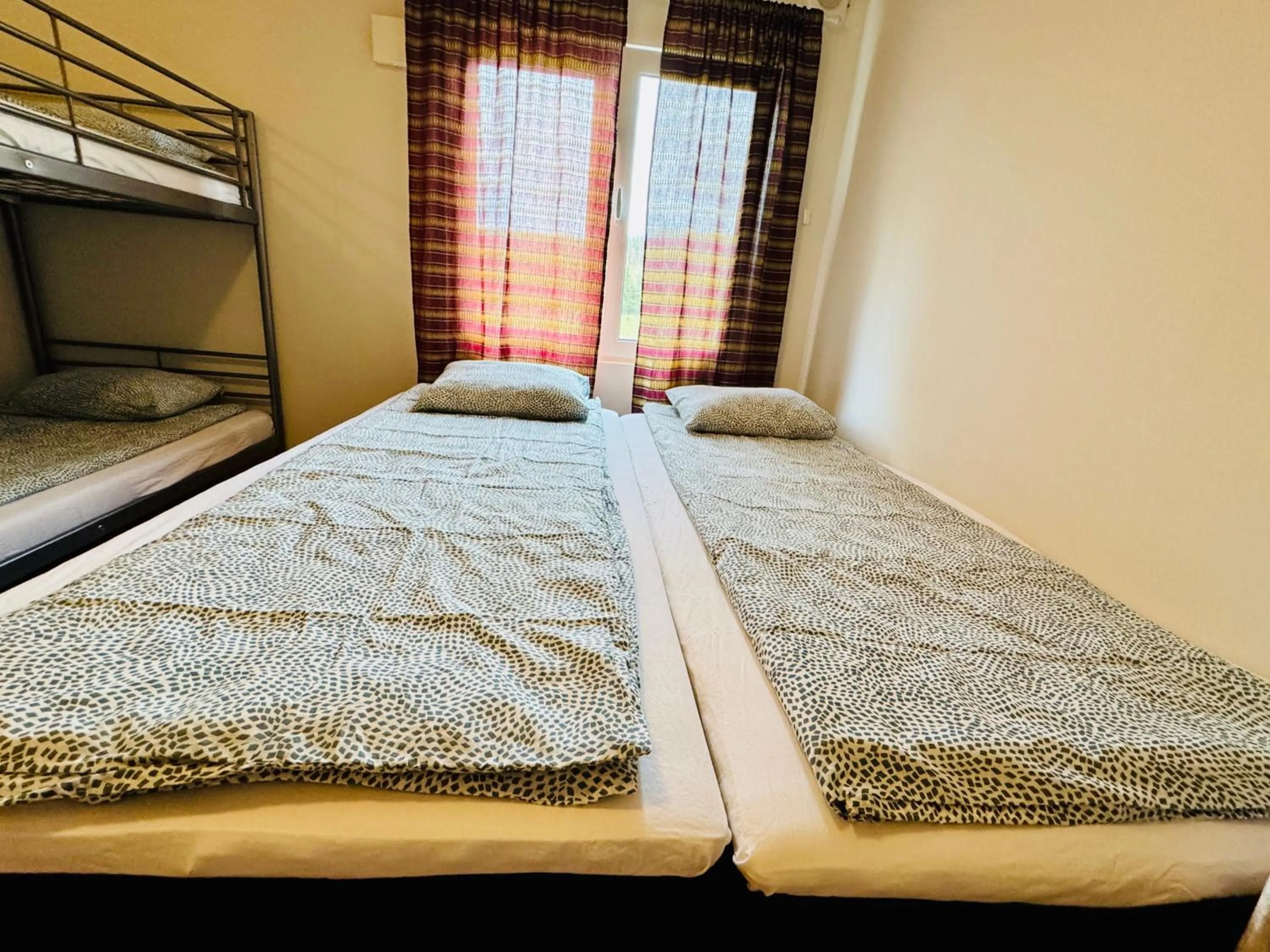 Bed in Hässlebogården Turist & Konferens