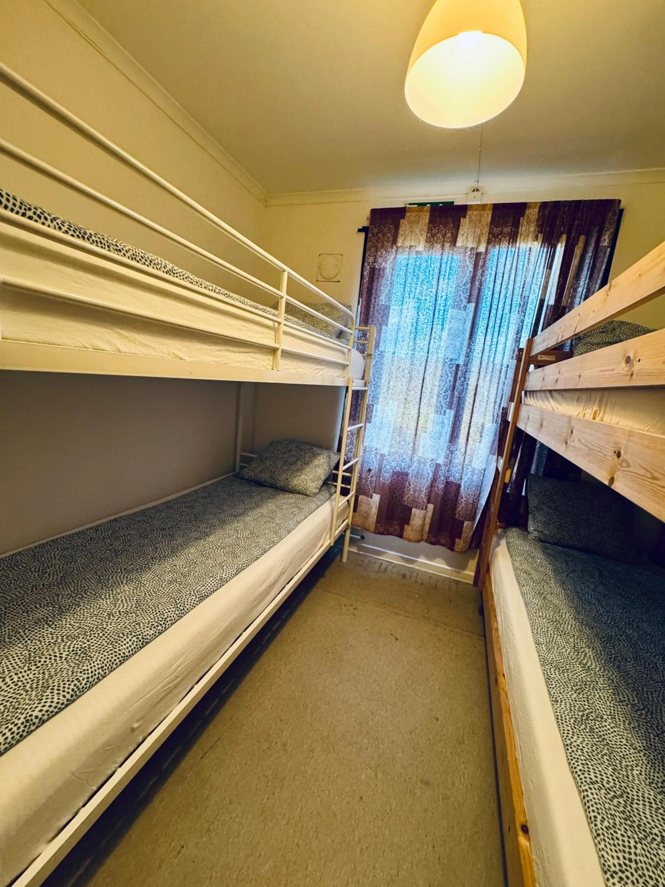 Bed in Hässlebogården Turist & Konferens