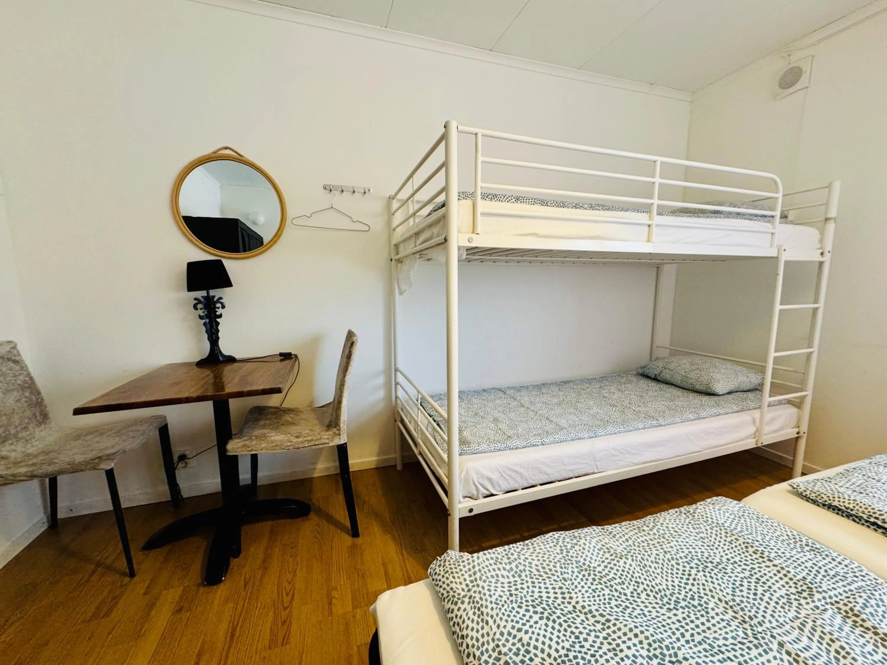 Bed in Hässlebogården Turist & Konferens