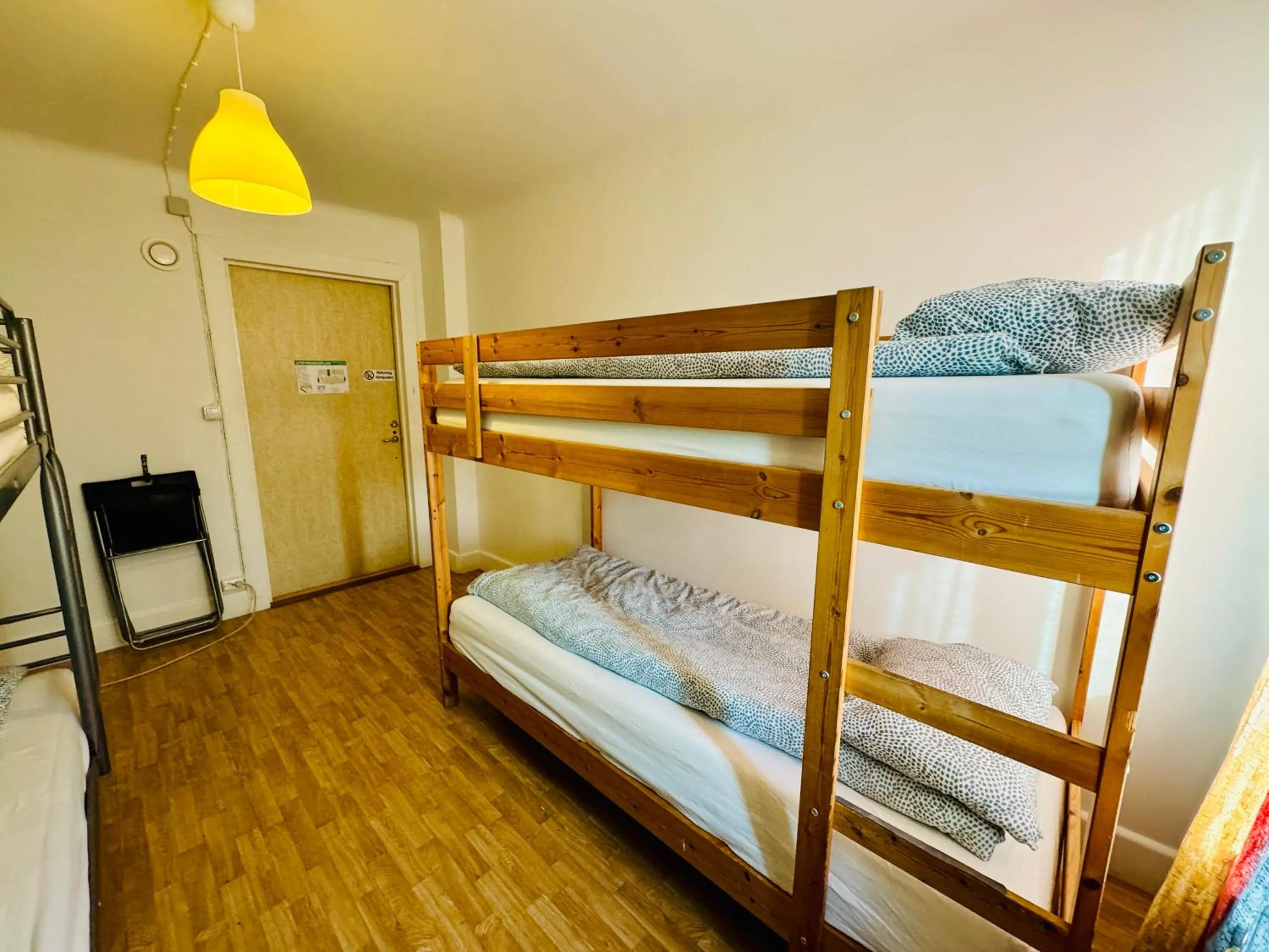 Bed in Hässlebogården Turist & Konferens