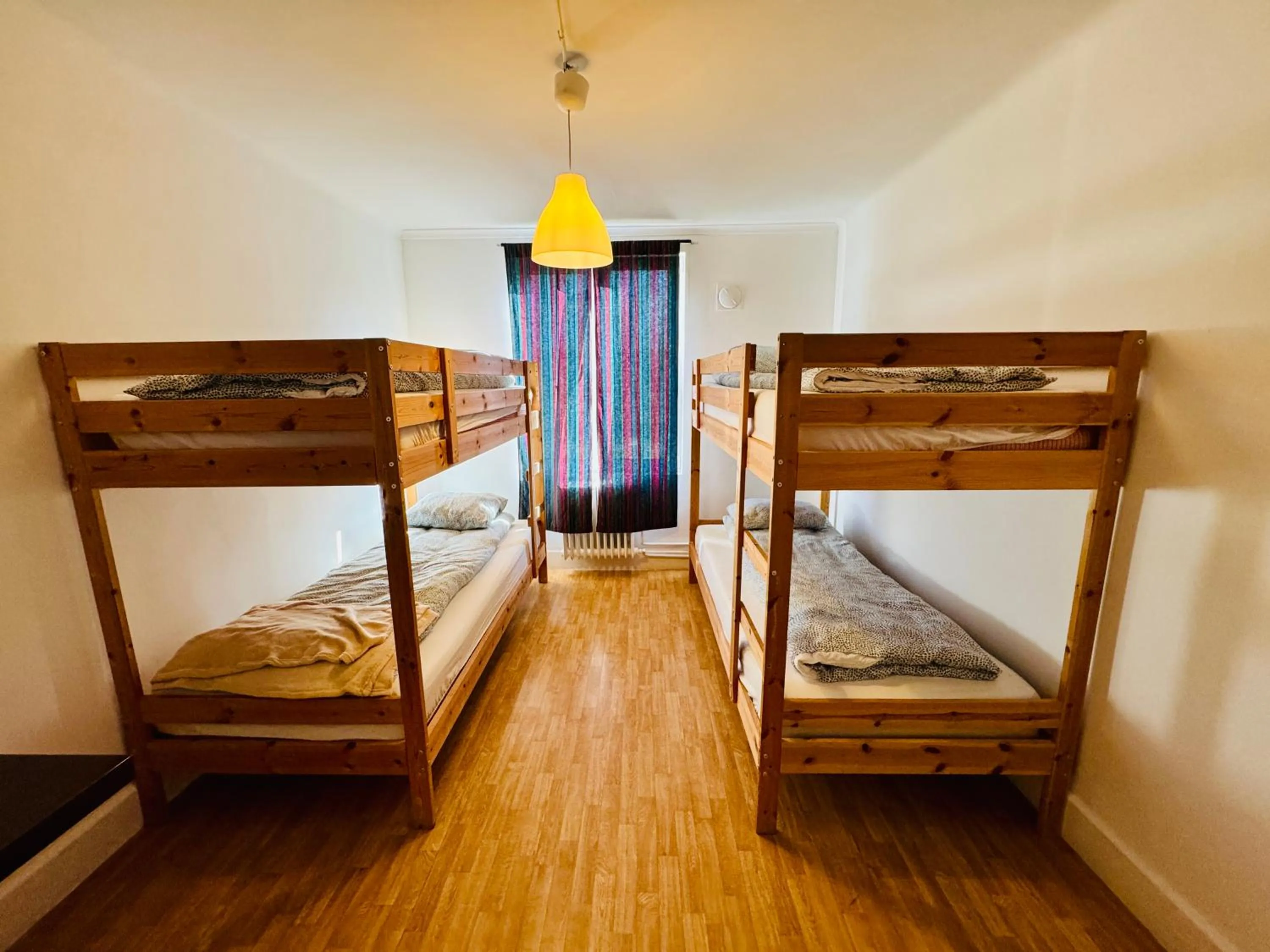 Bed in Hässlebogården Turist & Konferens