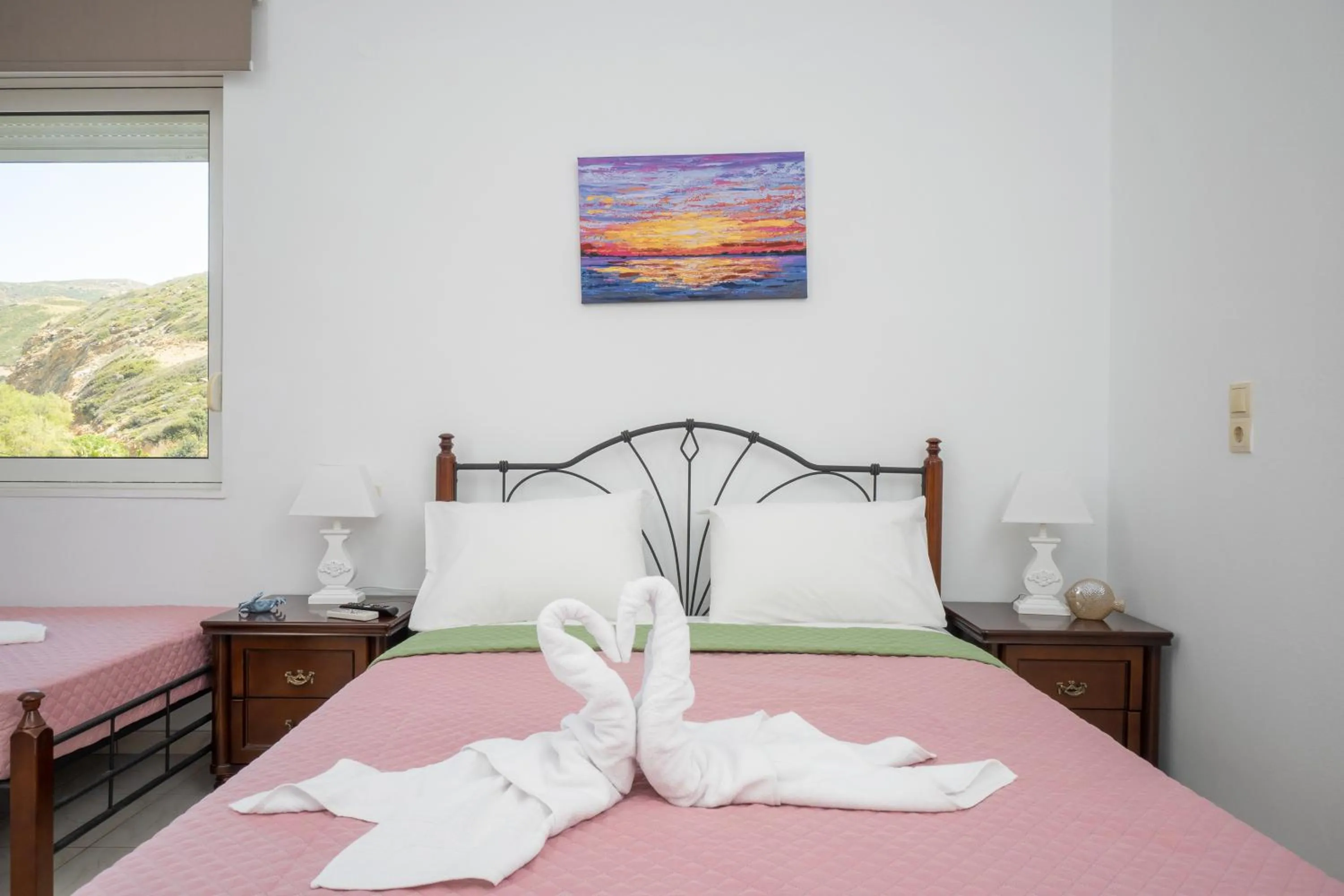 Bed in Almy Beach Hotel