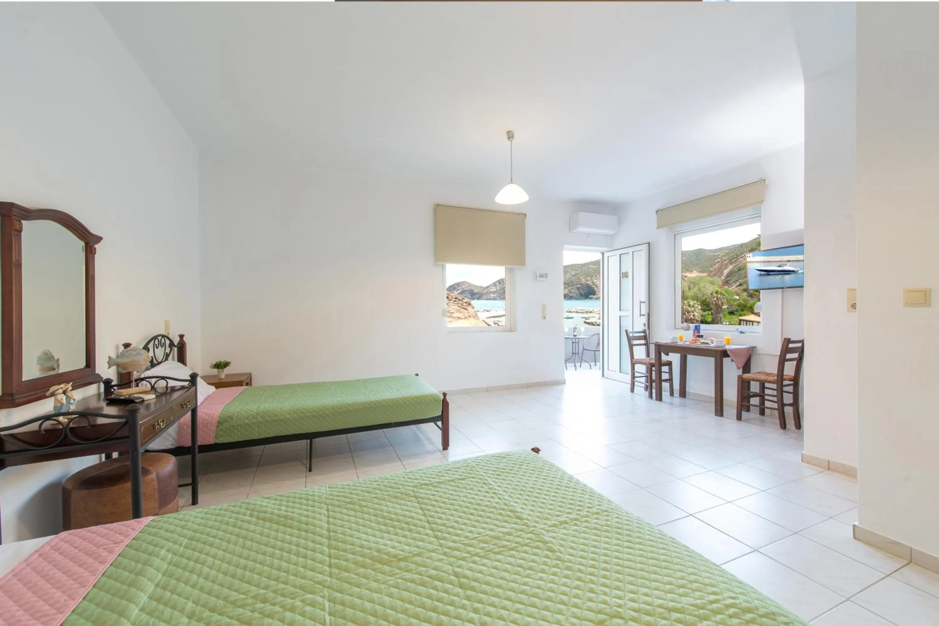 Bed in Almy Beach Hotel