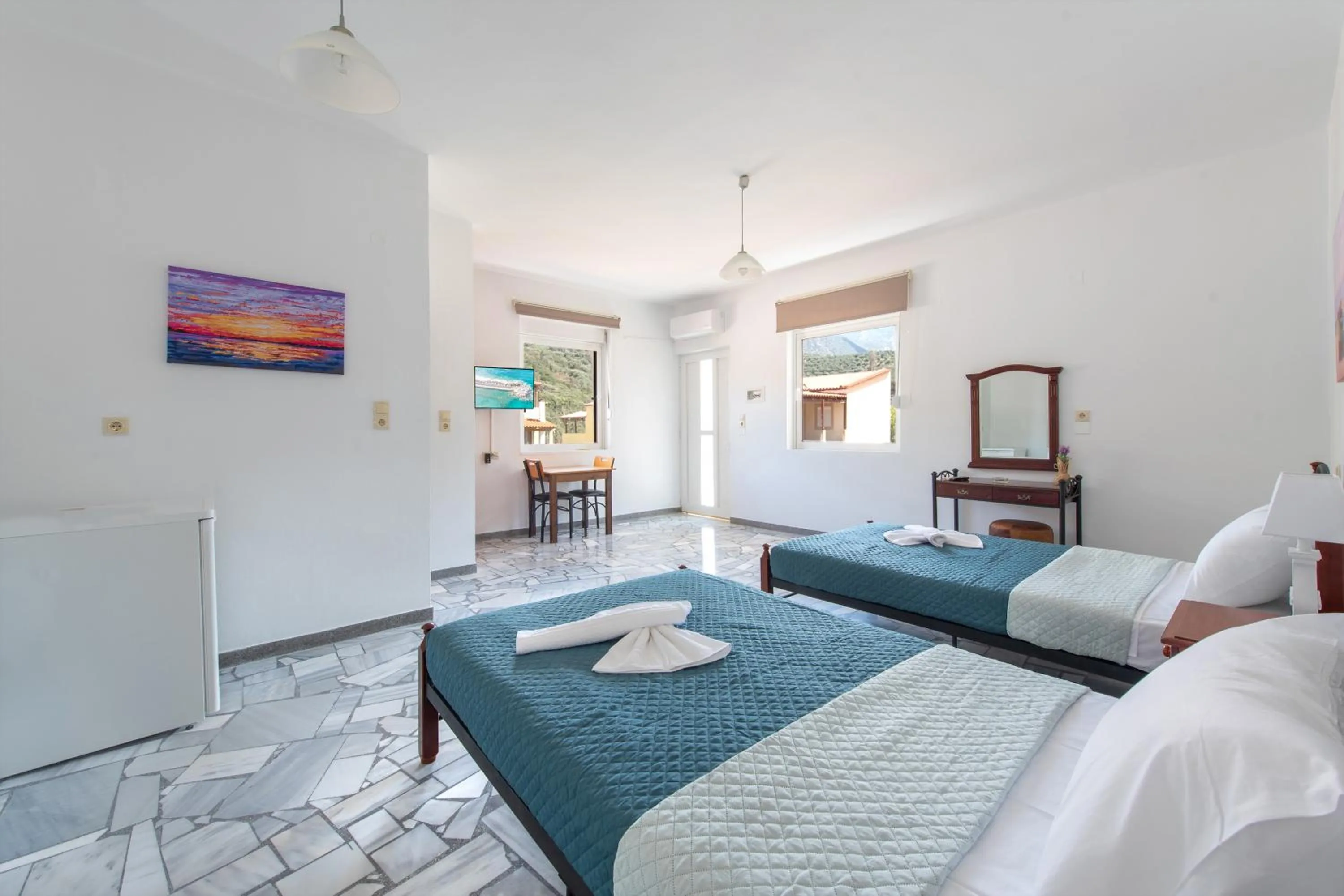 Bed in Almy Beach Hotel