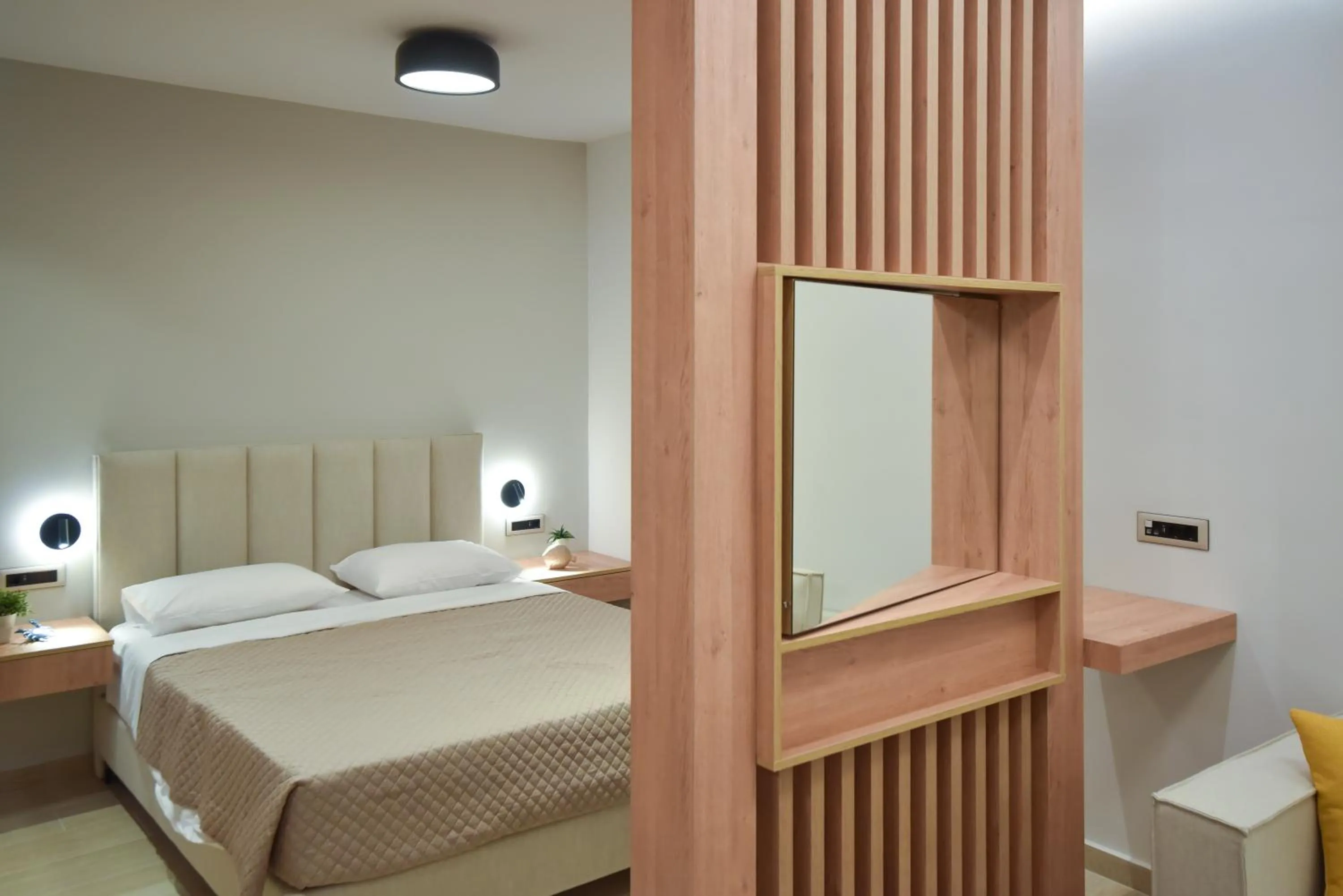 Bed in Almy Beach Hotel