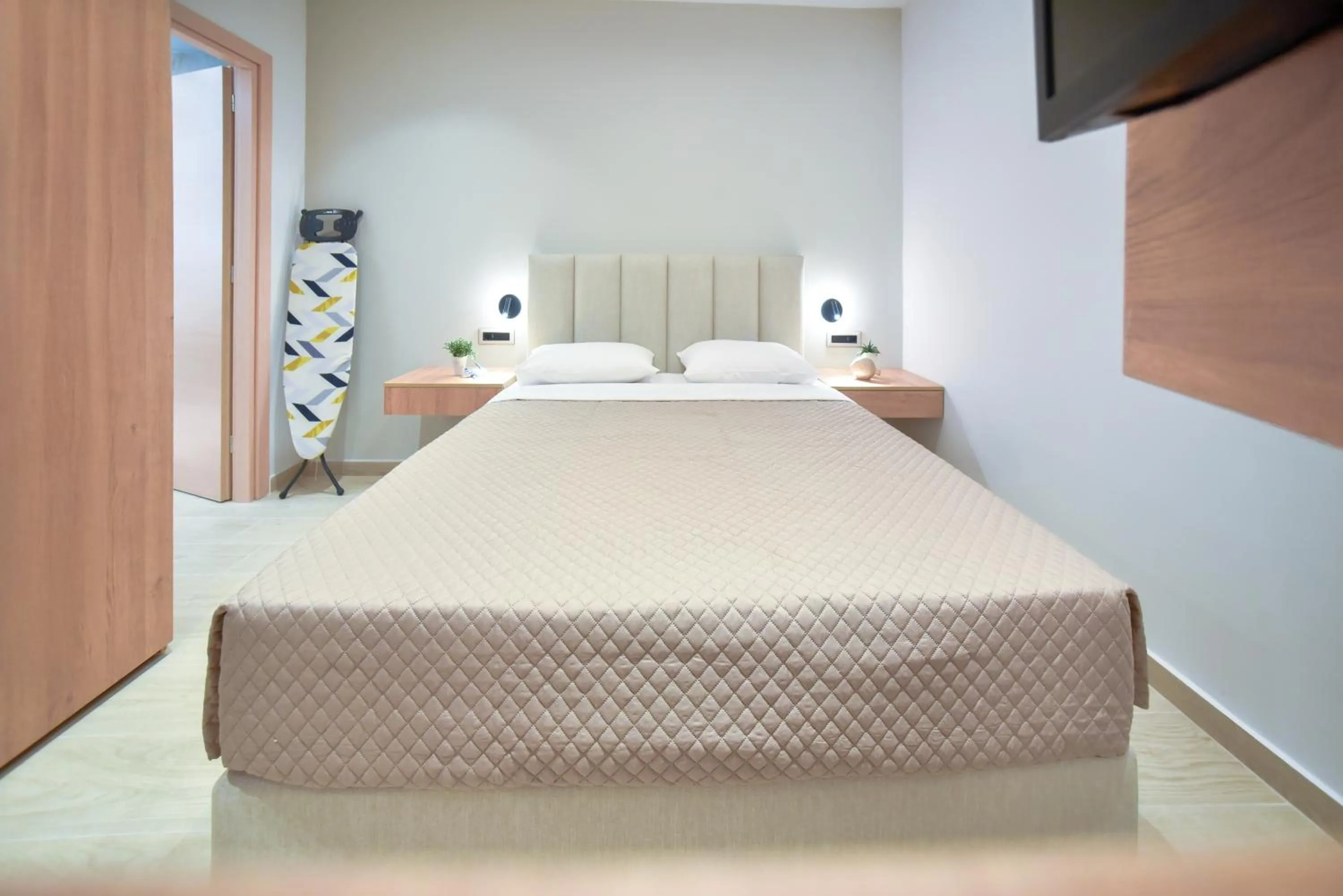 Bed in Almy Beach Hotel