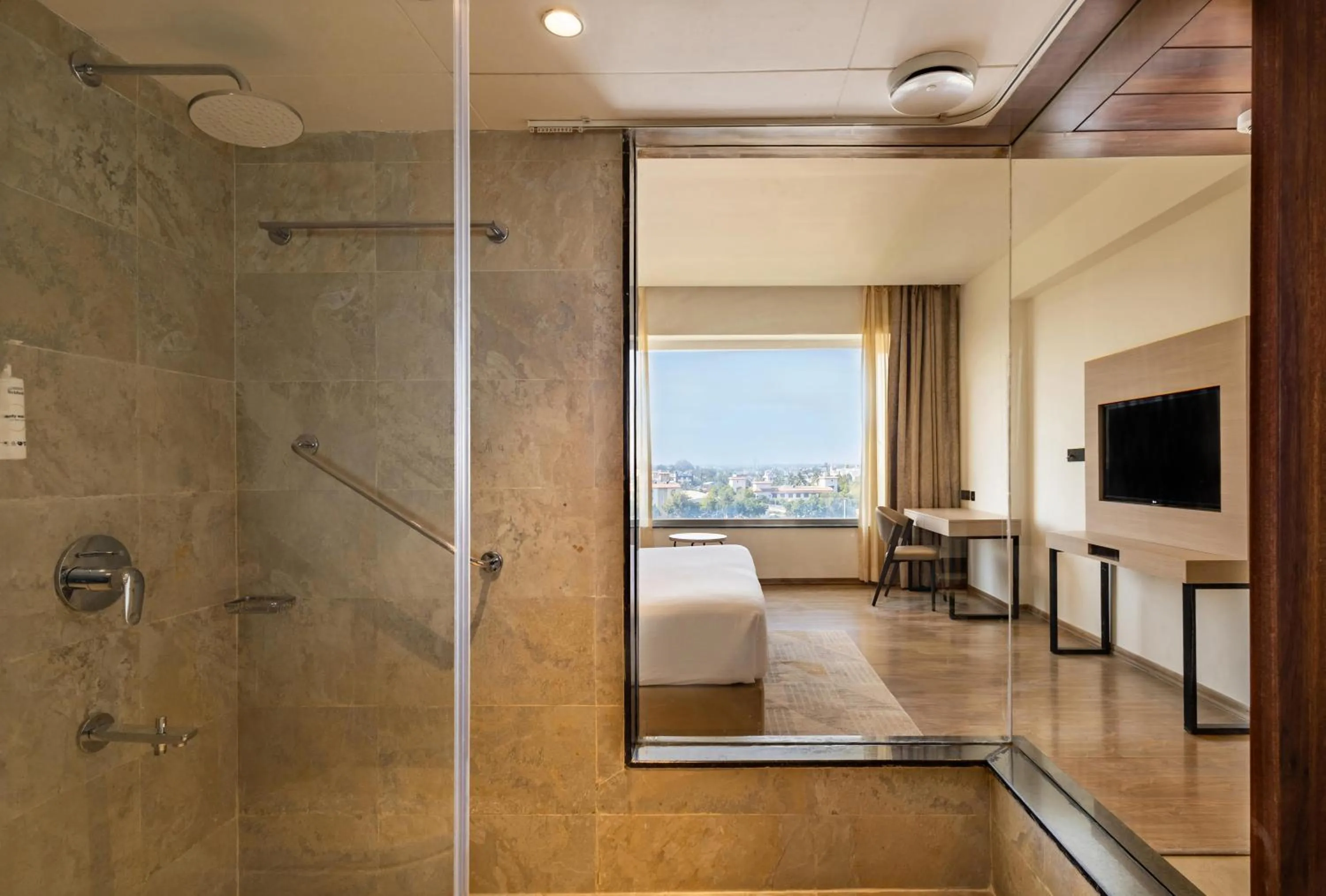 Bathroom, Bed in Temple Tree Hotel Shirdi, a member of Radisson Individuals